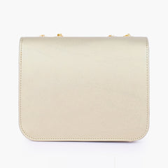Golden quilted chain cross-body bag