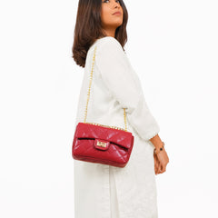 Maroon quilted mini bag with chain