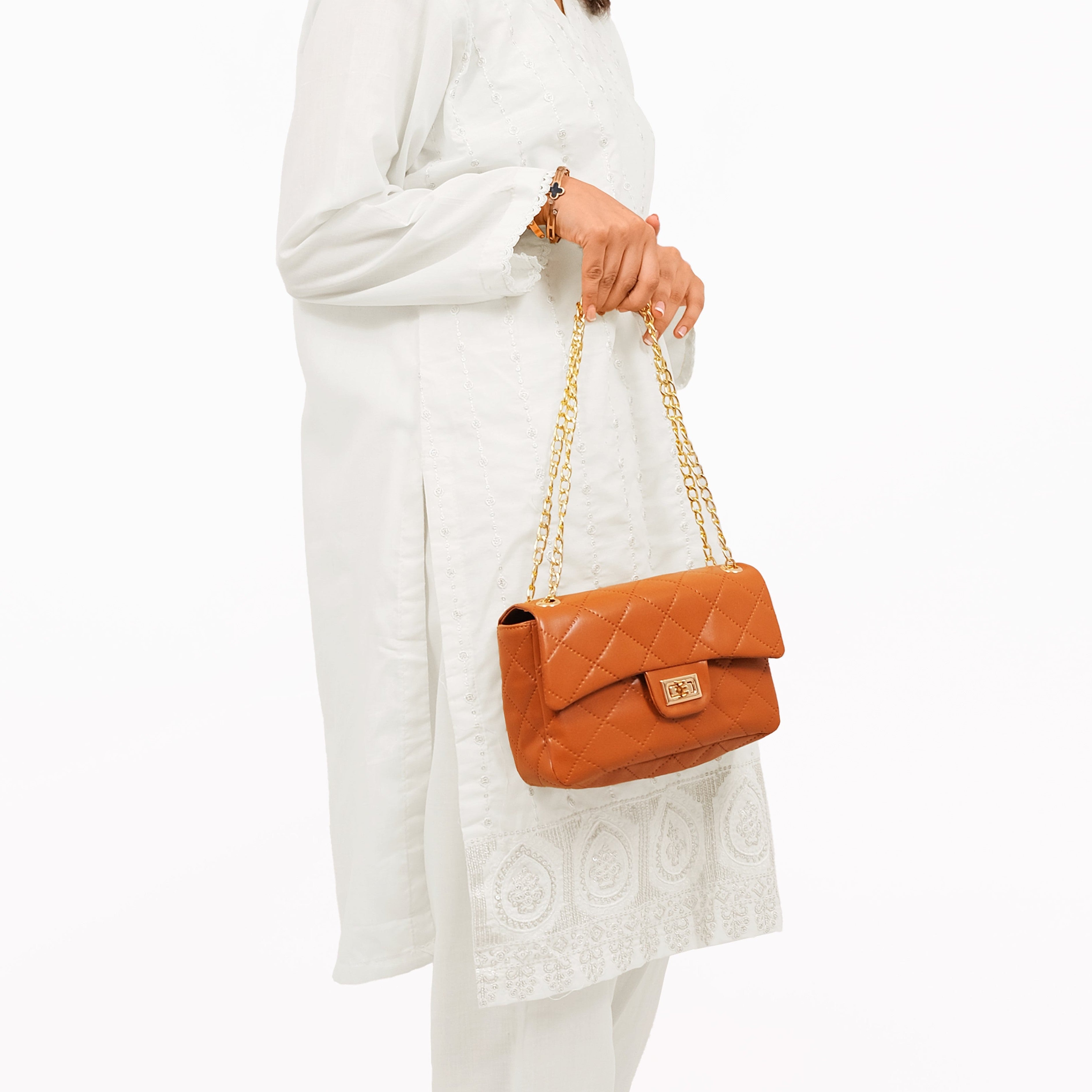 Mustard quilted mini bag with chain
