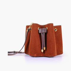 Dark brown suede star drawstring bucket bag