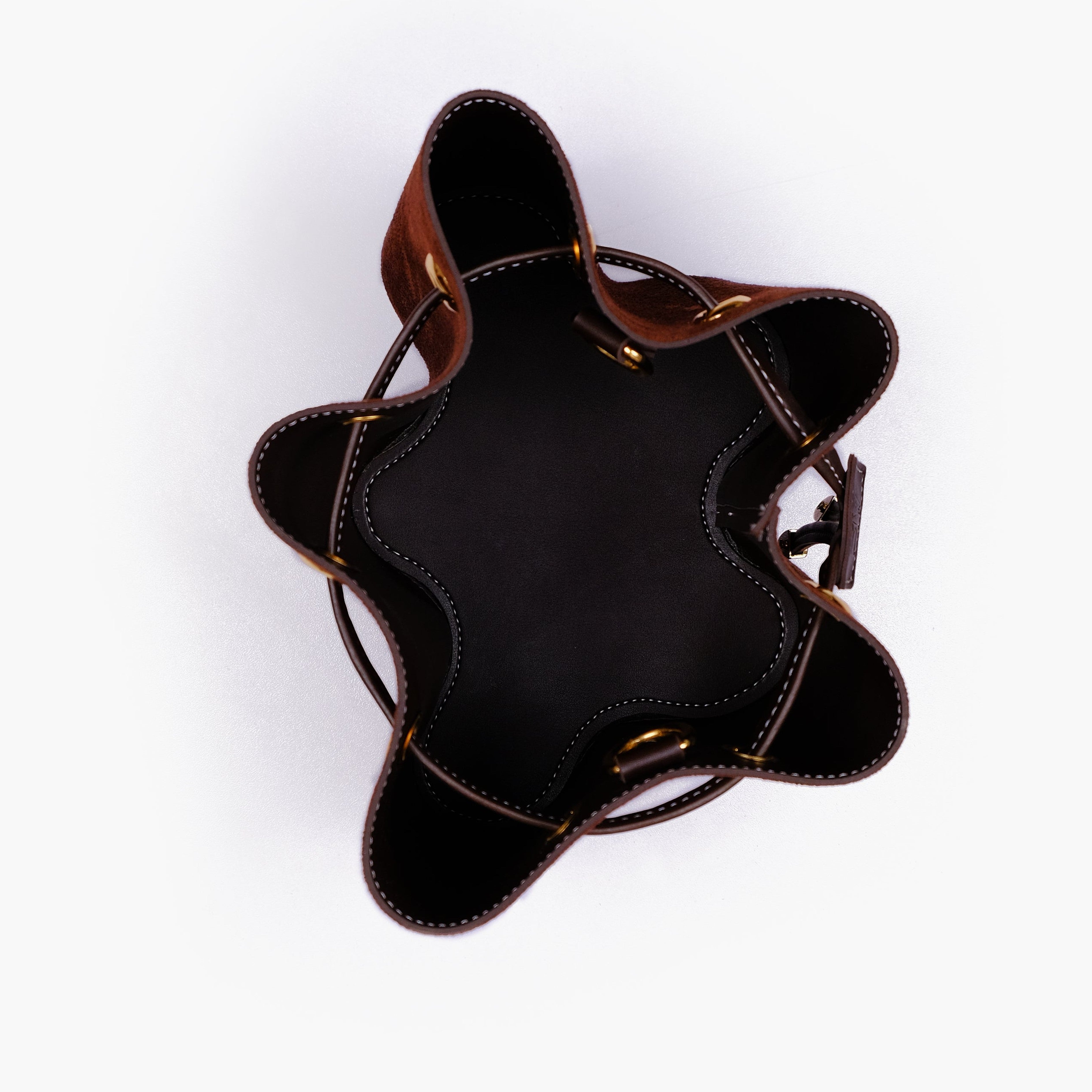 Dark brown suede star drawstring bucket bag