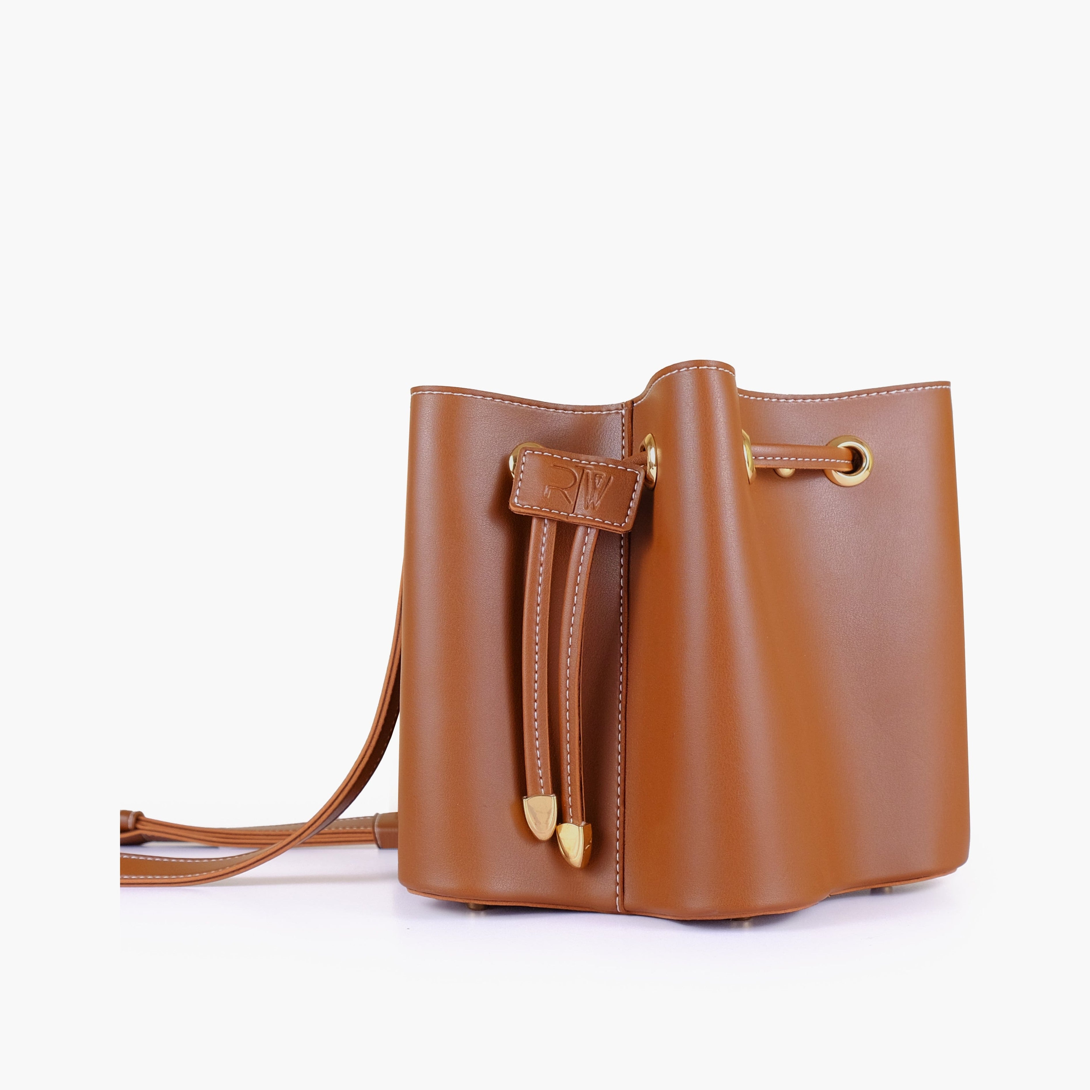 Brown star drawstring bucket bag