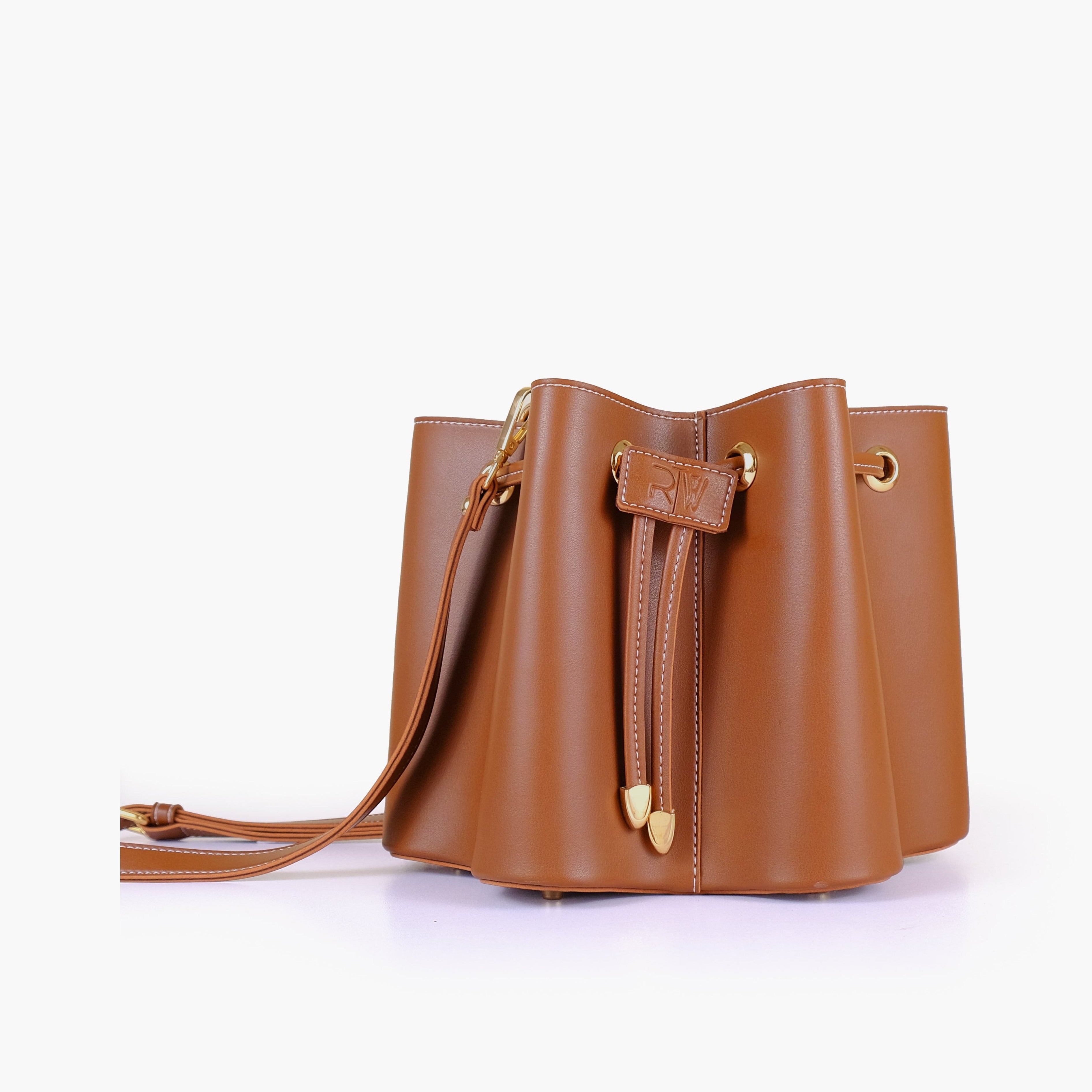 Brown star drawstring bucket bag