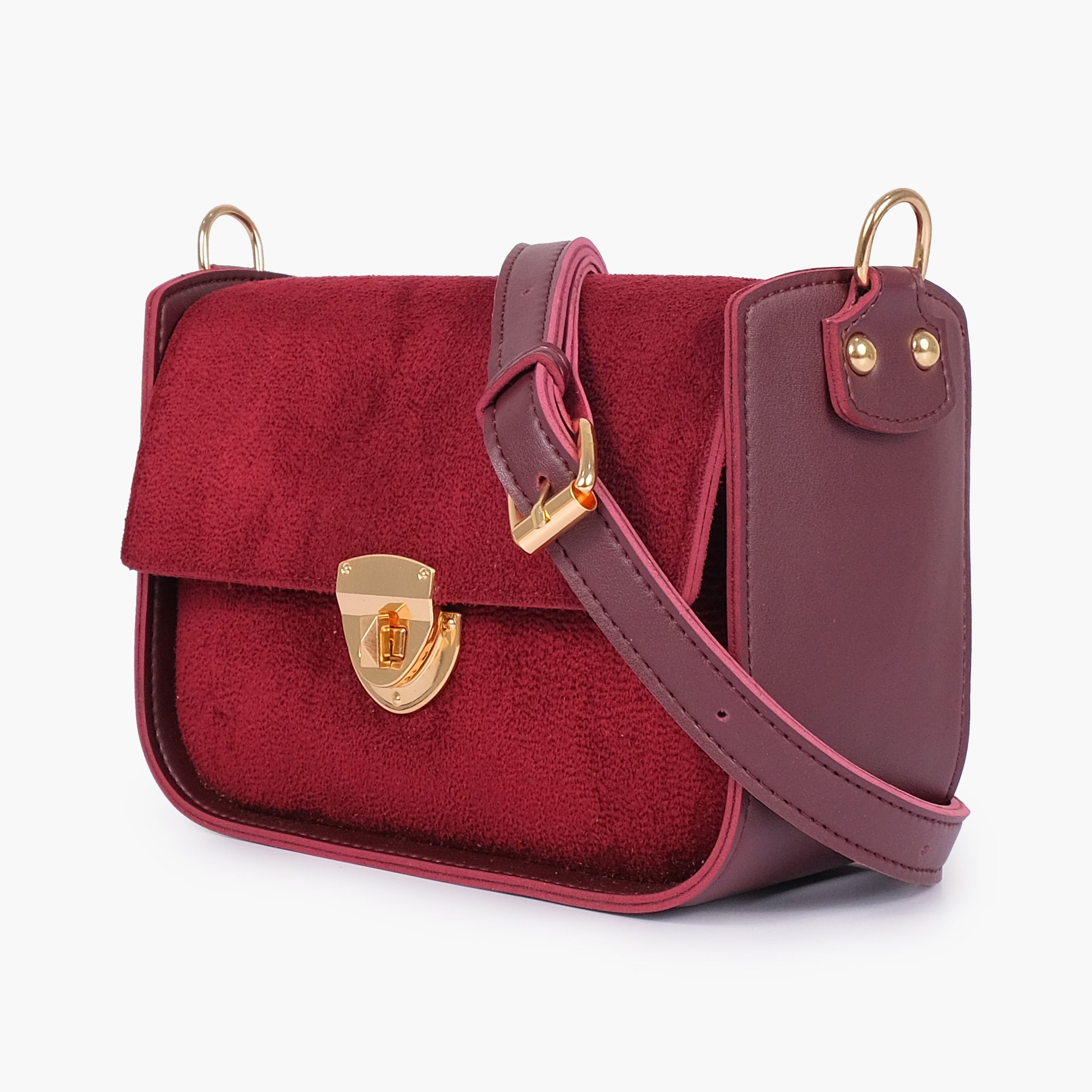 Burgundy suede saddle bag with twist lock