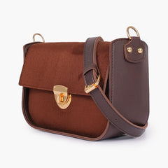 Dark brown suede saddle bag with twist lock