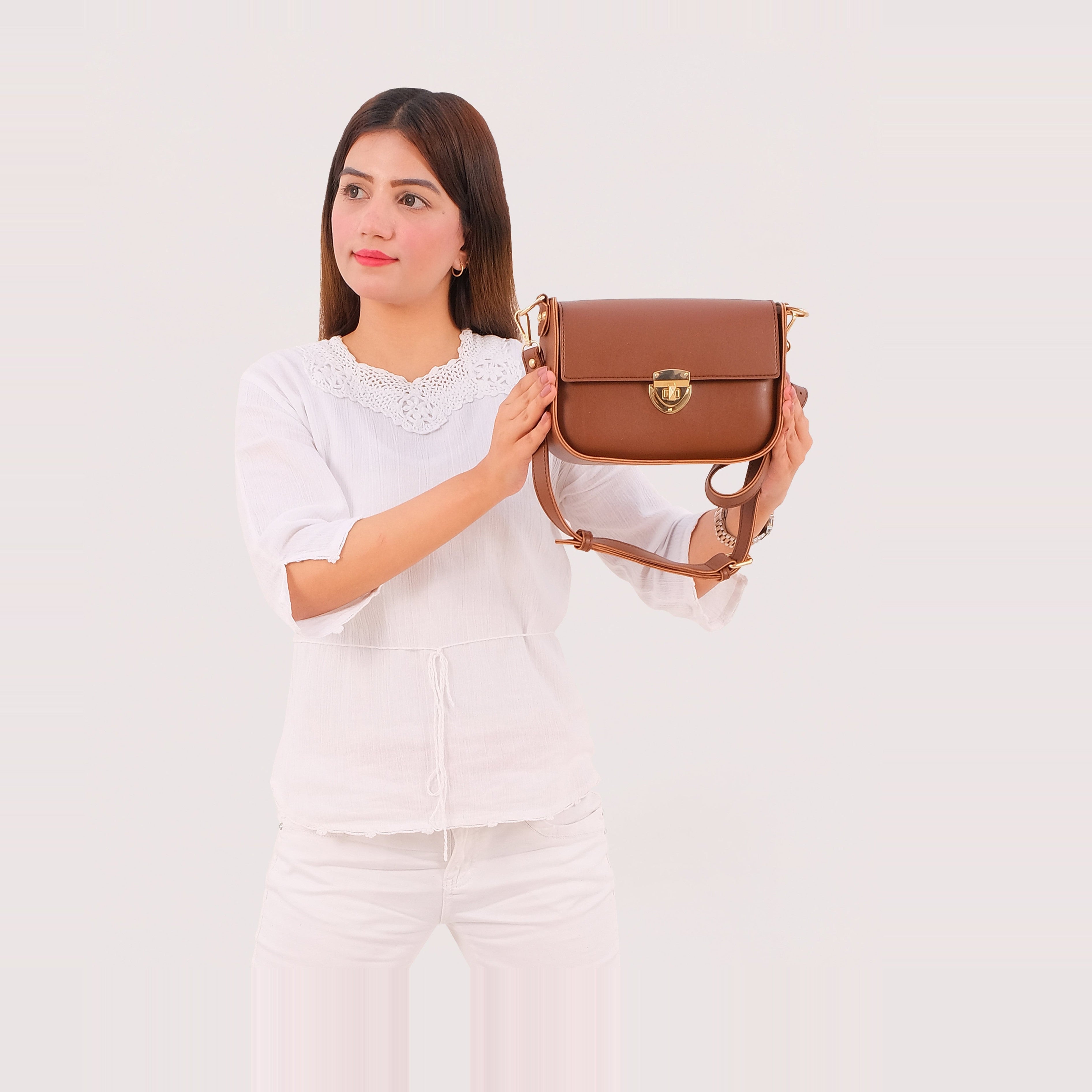 Brown saddle bag with twist lock