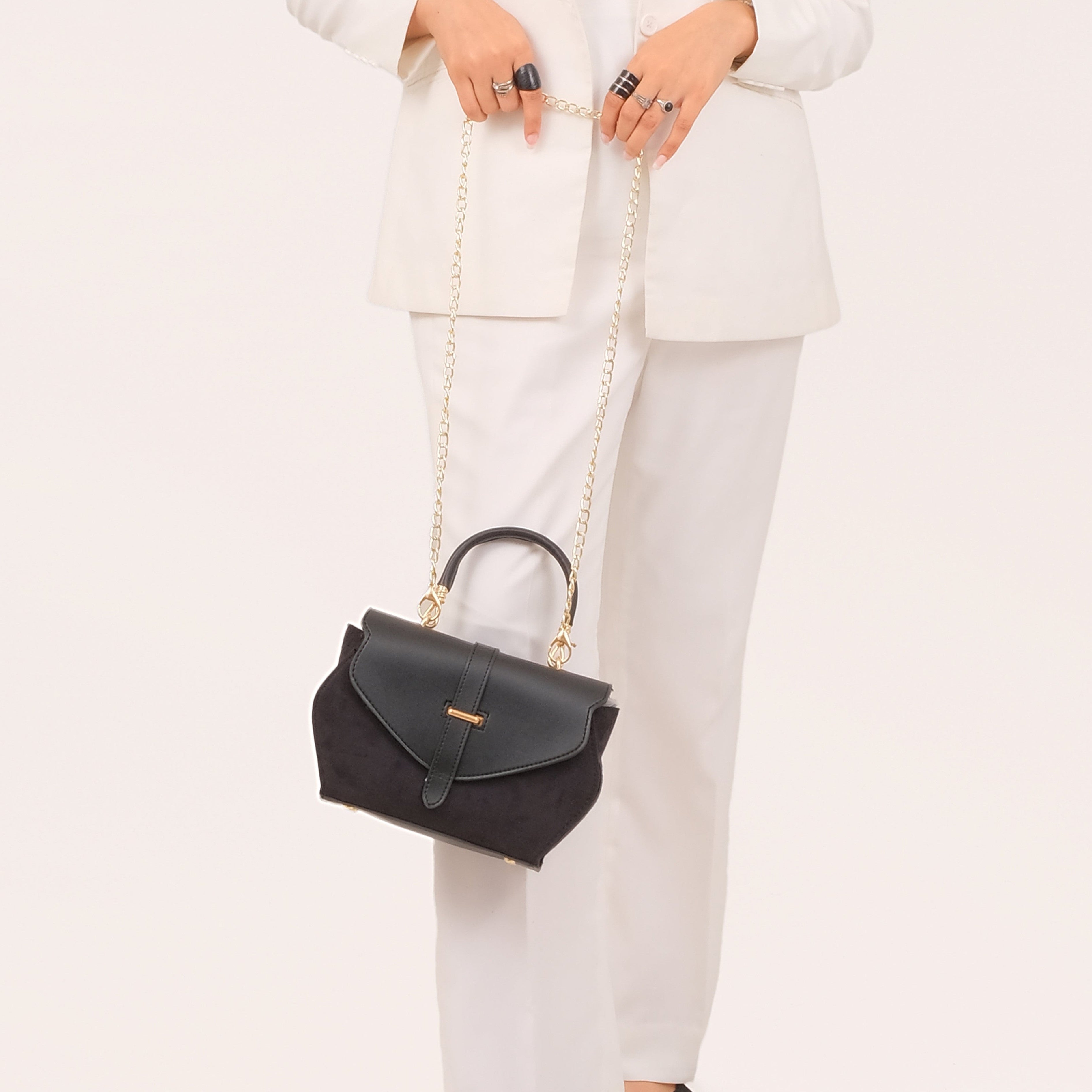 Black top-handle hexagon bag