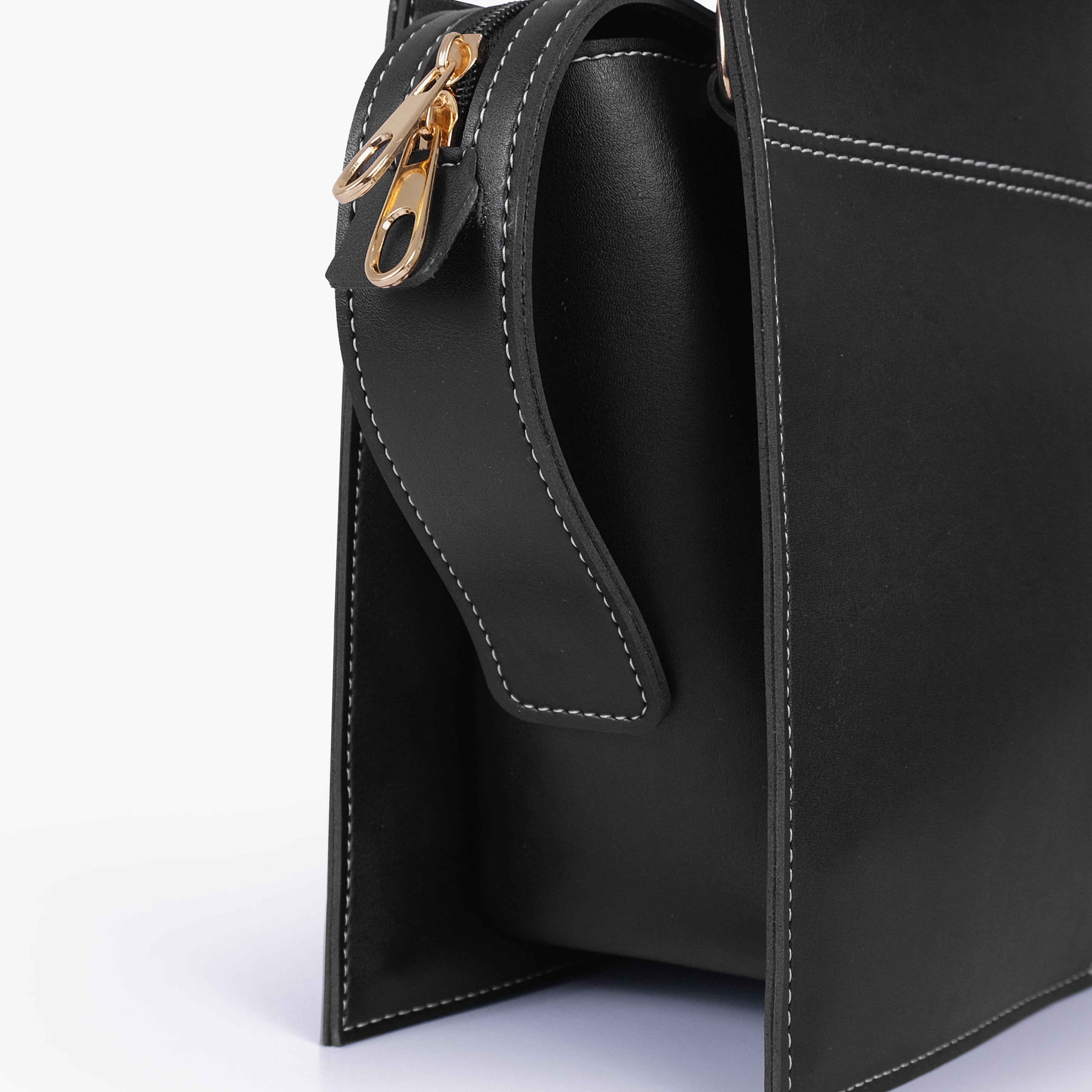 Black trapeze top-handle bag