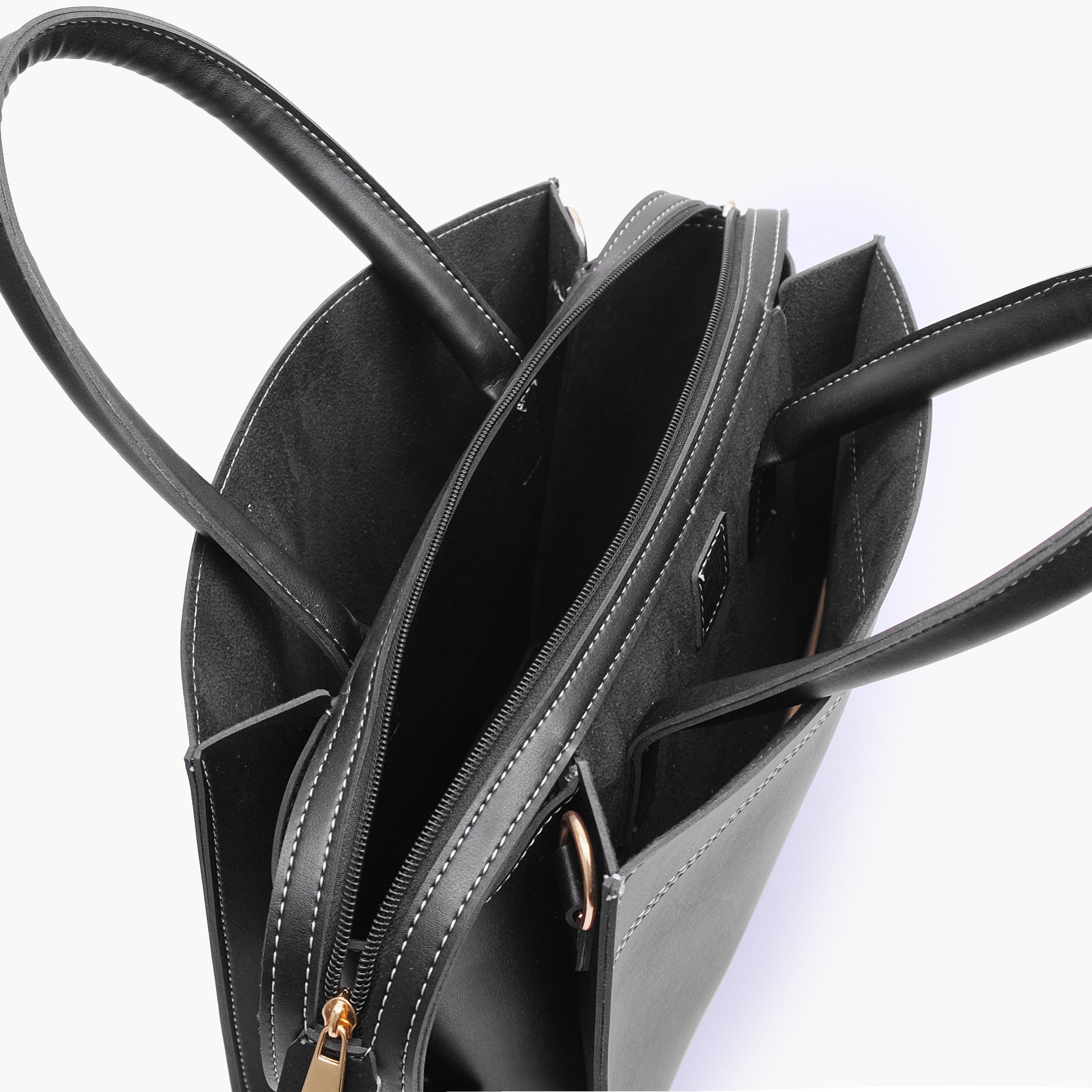 Black trapeze top-handle bag