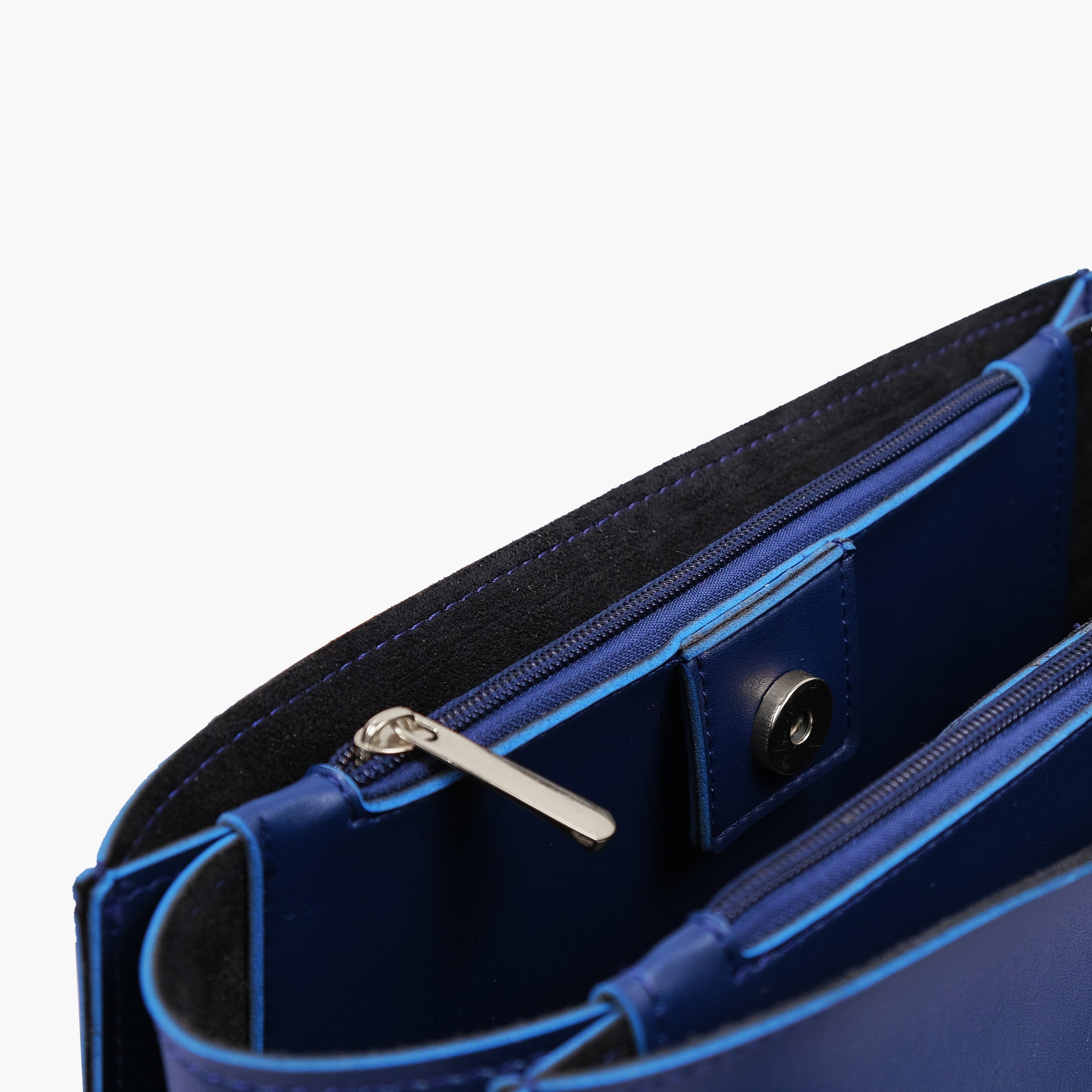 Blue zipper shoulder bag with long handle