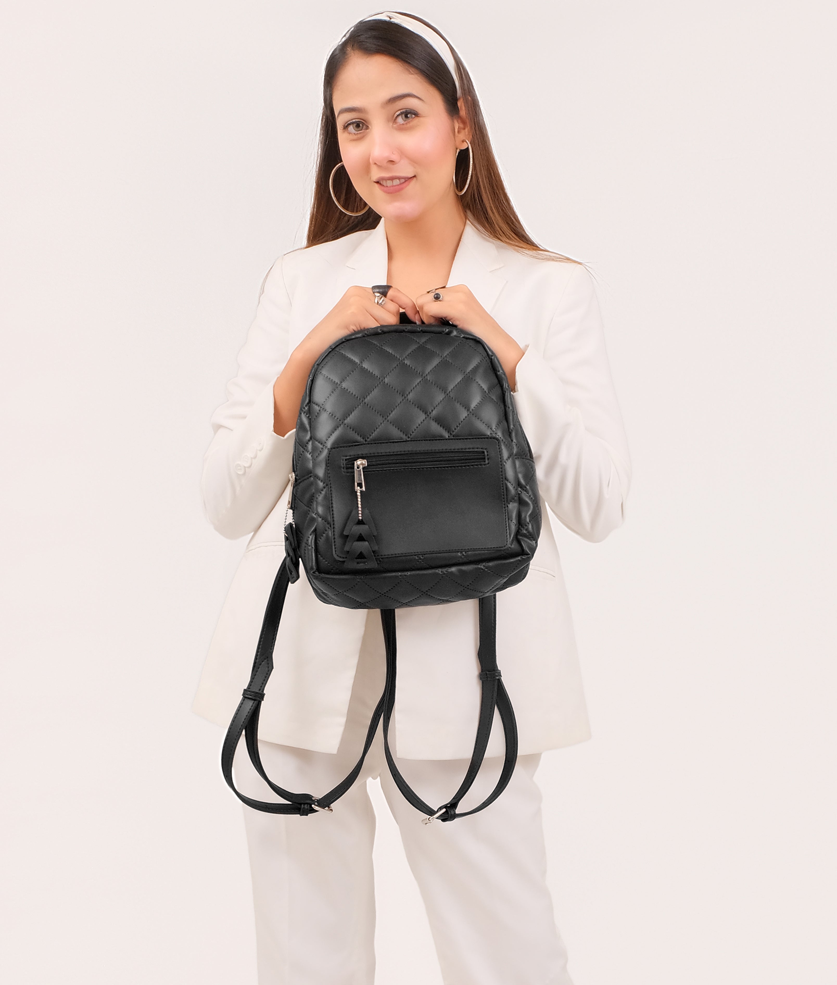 Black quilted mini backpack