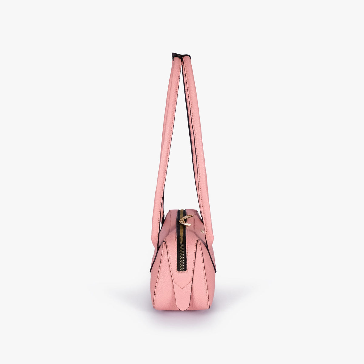 Side profile of blush pink east-west baguette bag