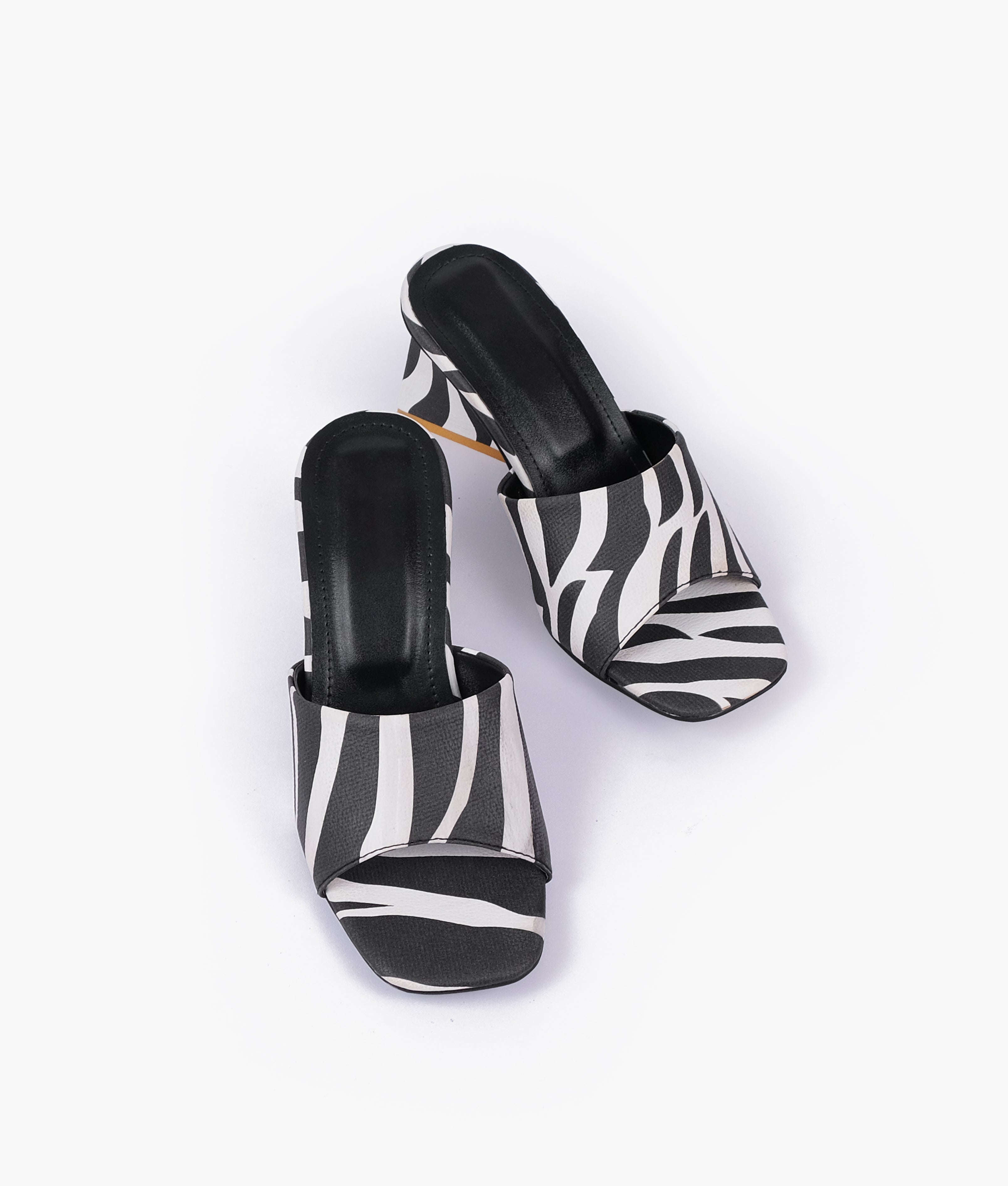 Chic zebra heeled mules