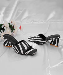 Chic zebra heeled mules