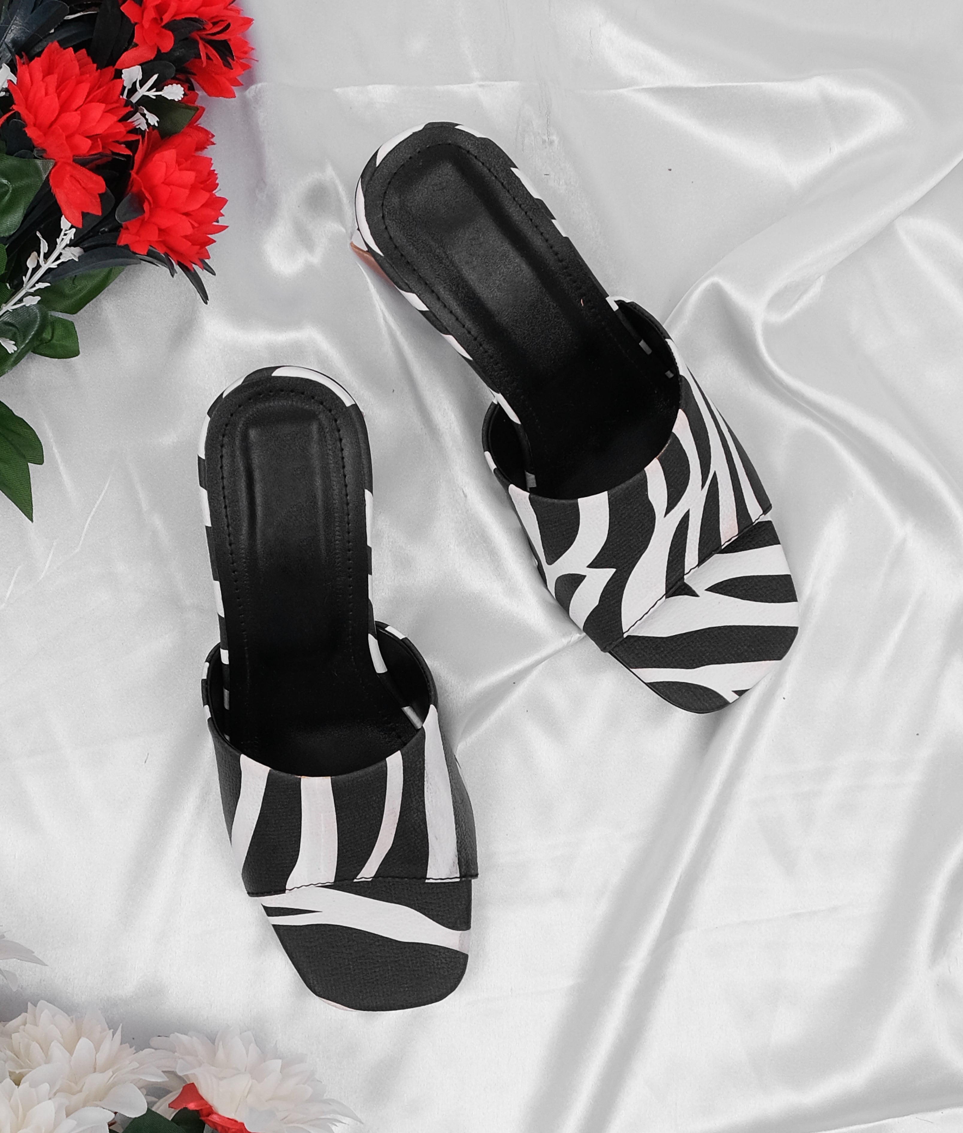 Chic zebra heeled mules