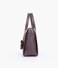 Dark brown handbag with flower charm