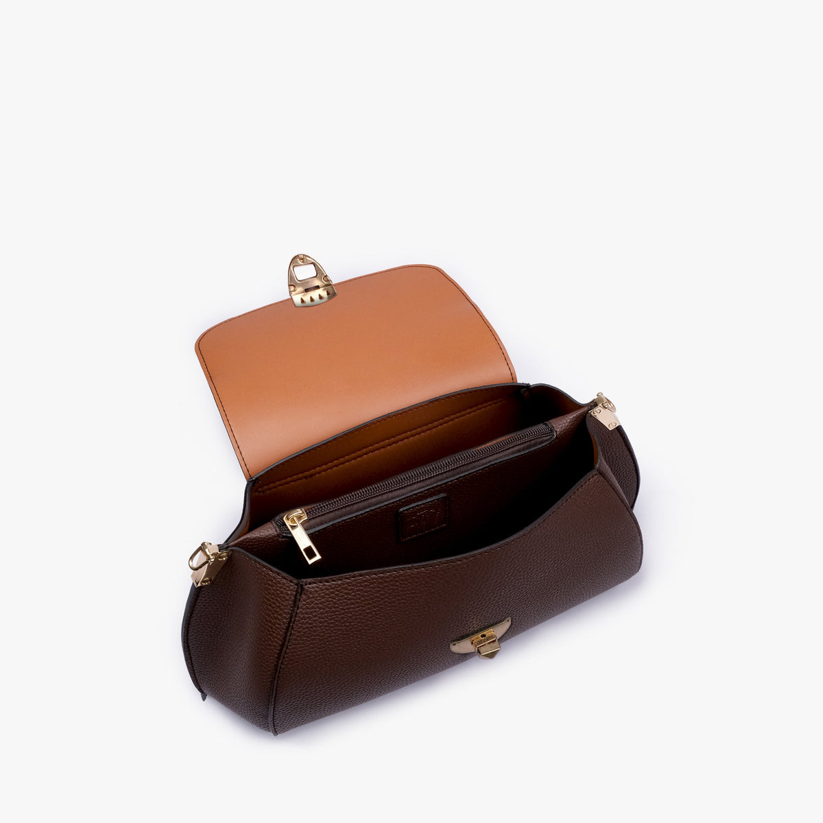 Interior of Dark brown pebble baguette bag with the flap open showing the zippered main compartment