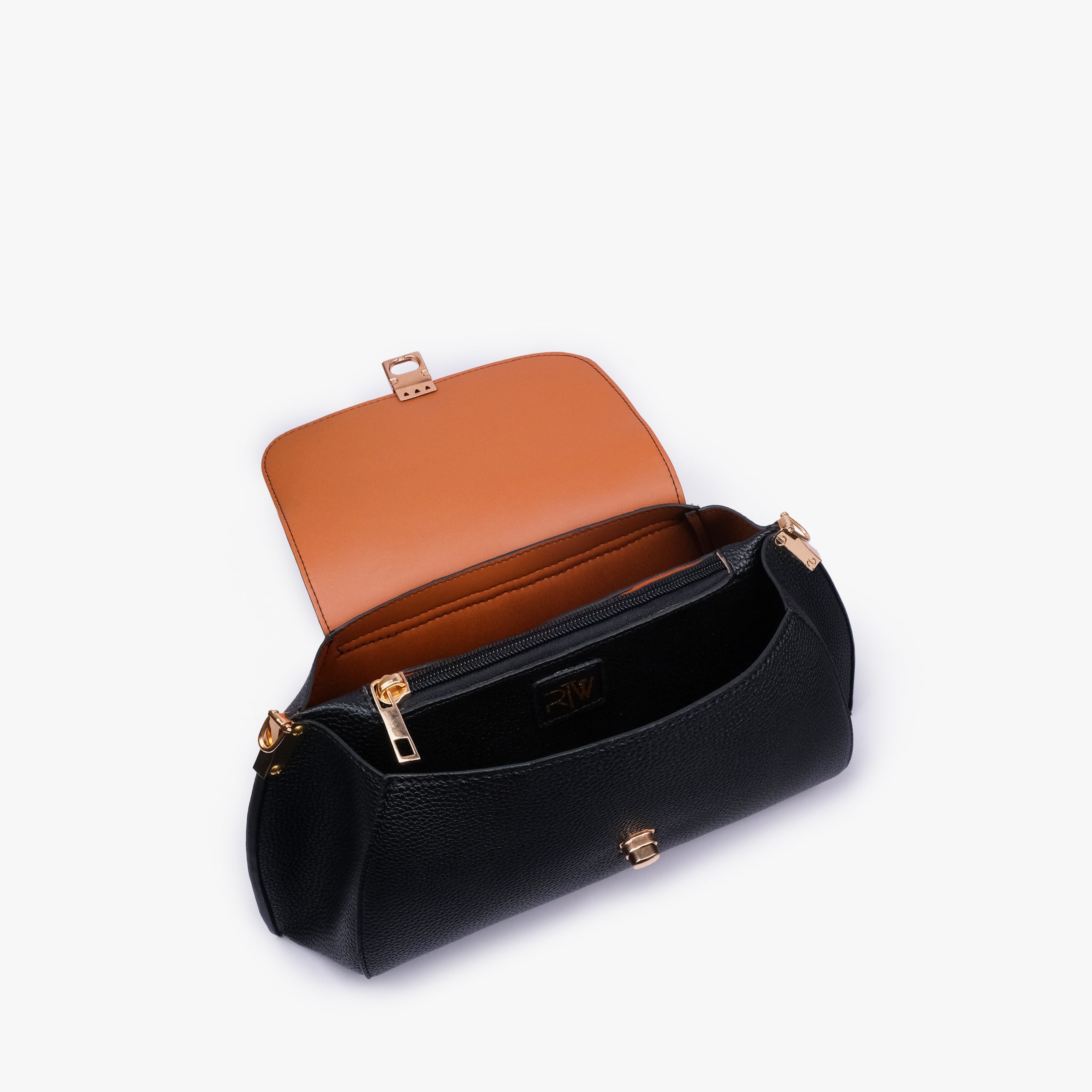 Interior of Black pebble baguette bag showing the zippered main compartment