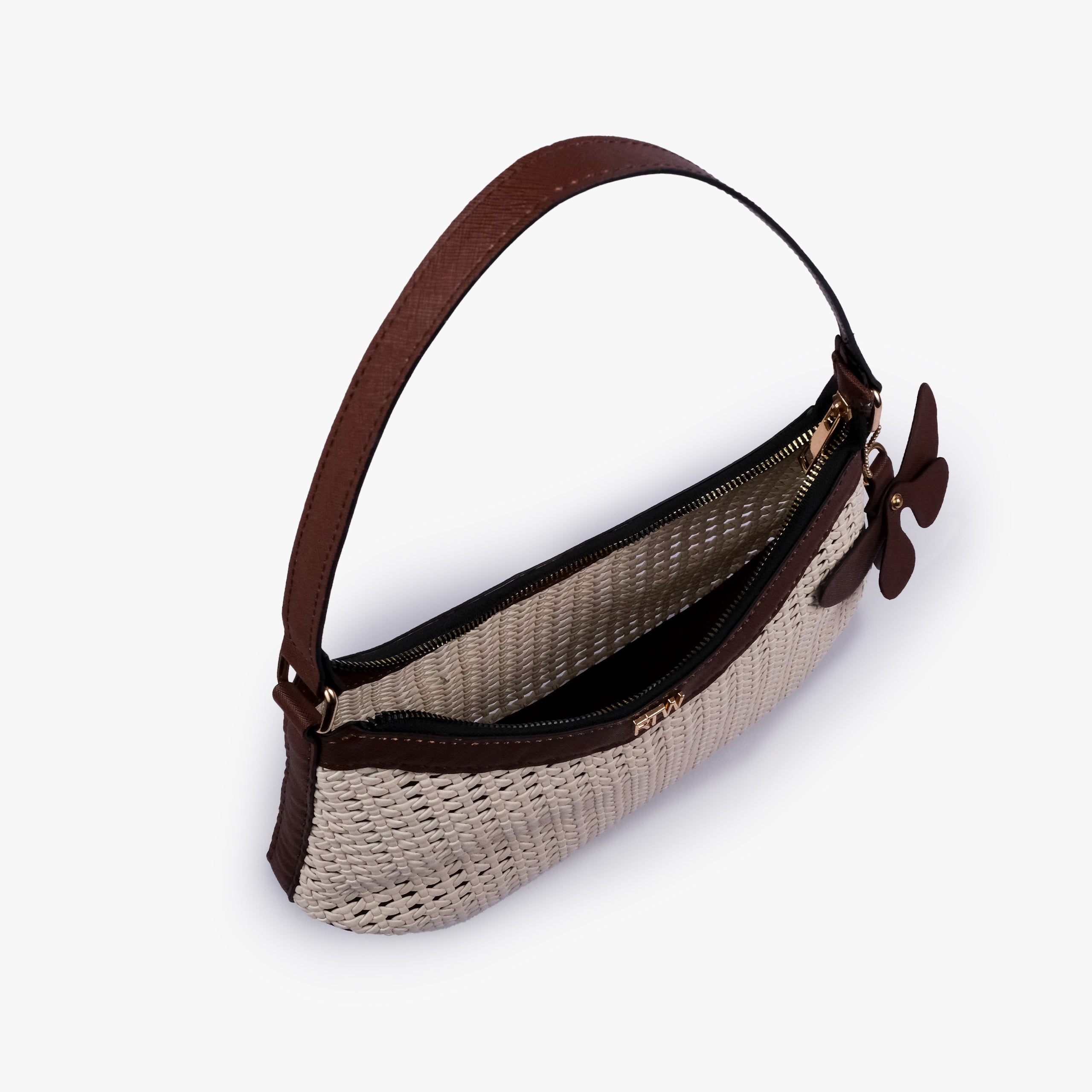 Lined interior and zip-top opening of Mocha woven shoulder bag