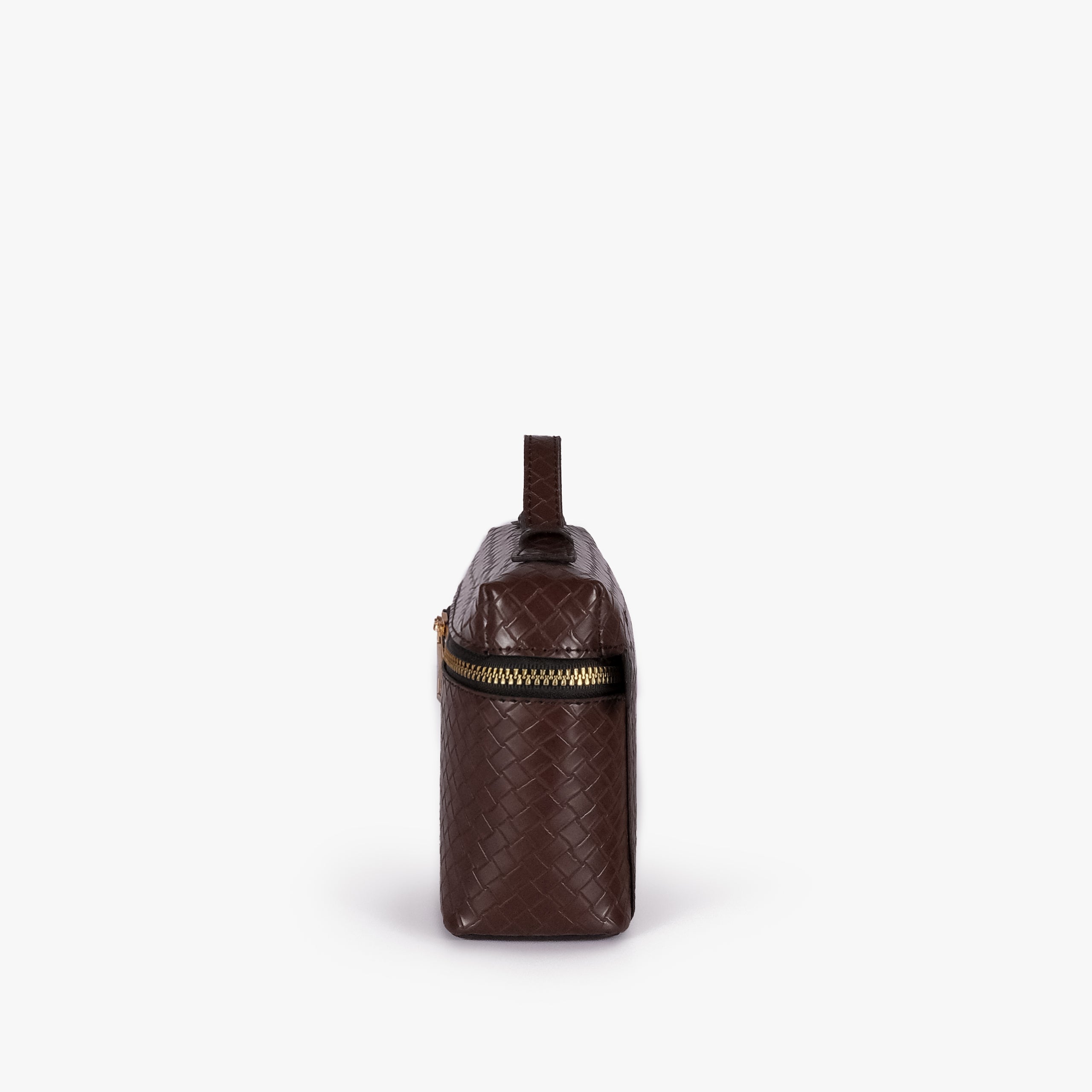 Chocolate brown weave vanity top-handle bag — side profile showing the structured depth, wraparound zipper band near the top, side attachment tab, and long strap