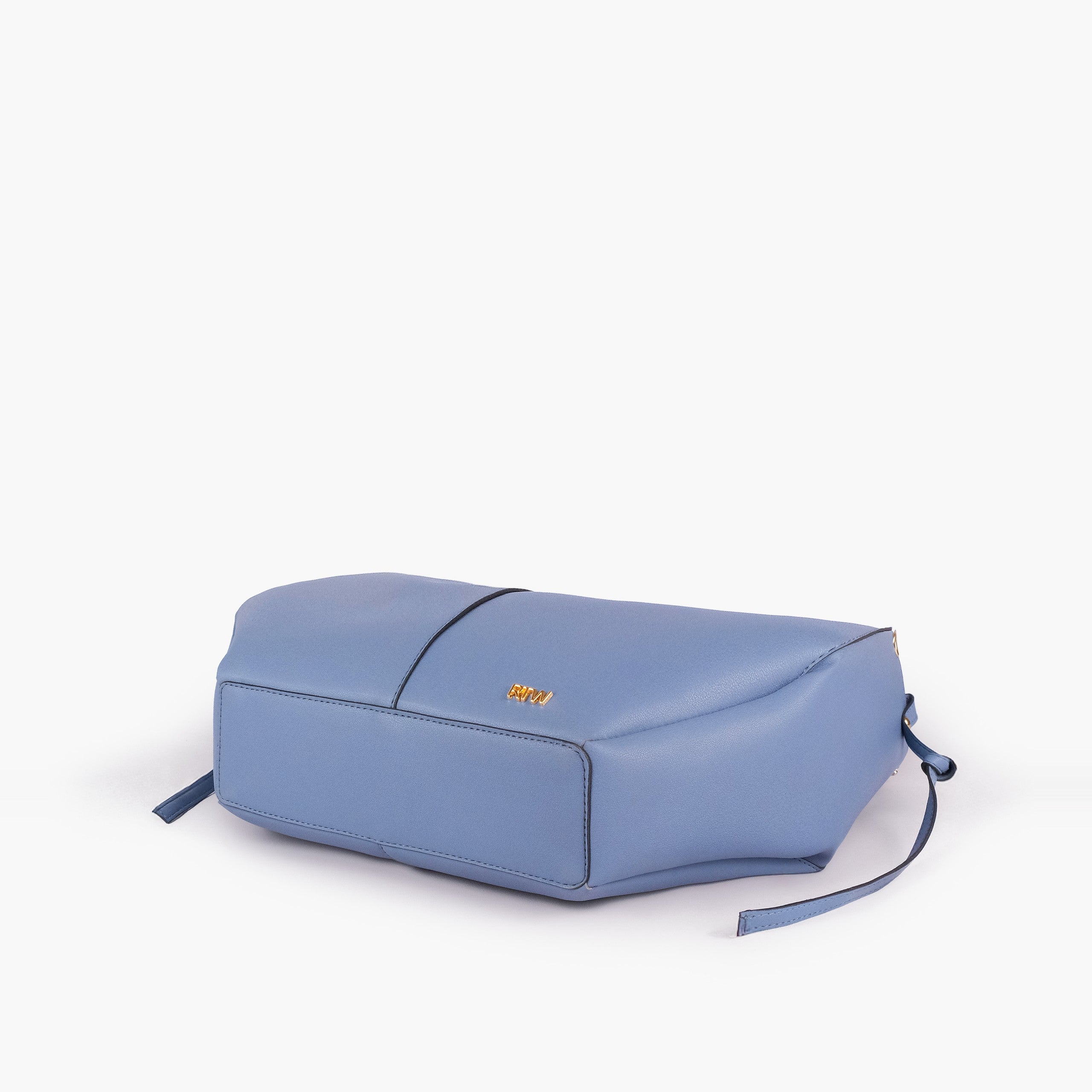 Sky blue atelier tote — base angle showing reinforced flat base, gold RTW logo on front-bottom face