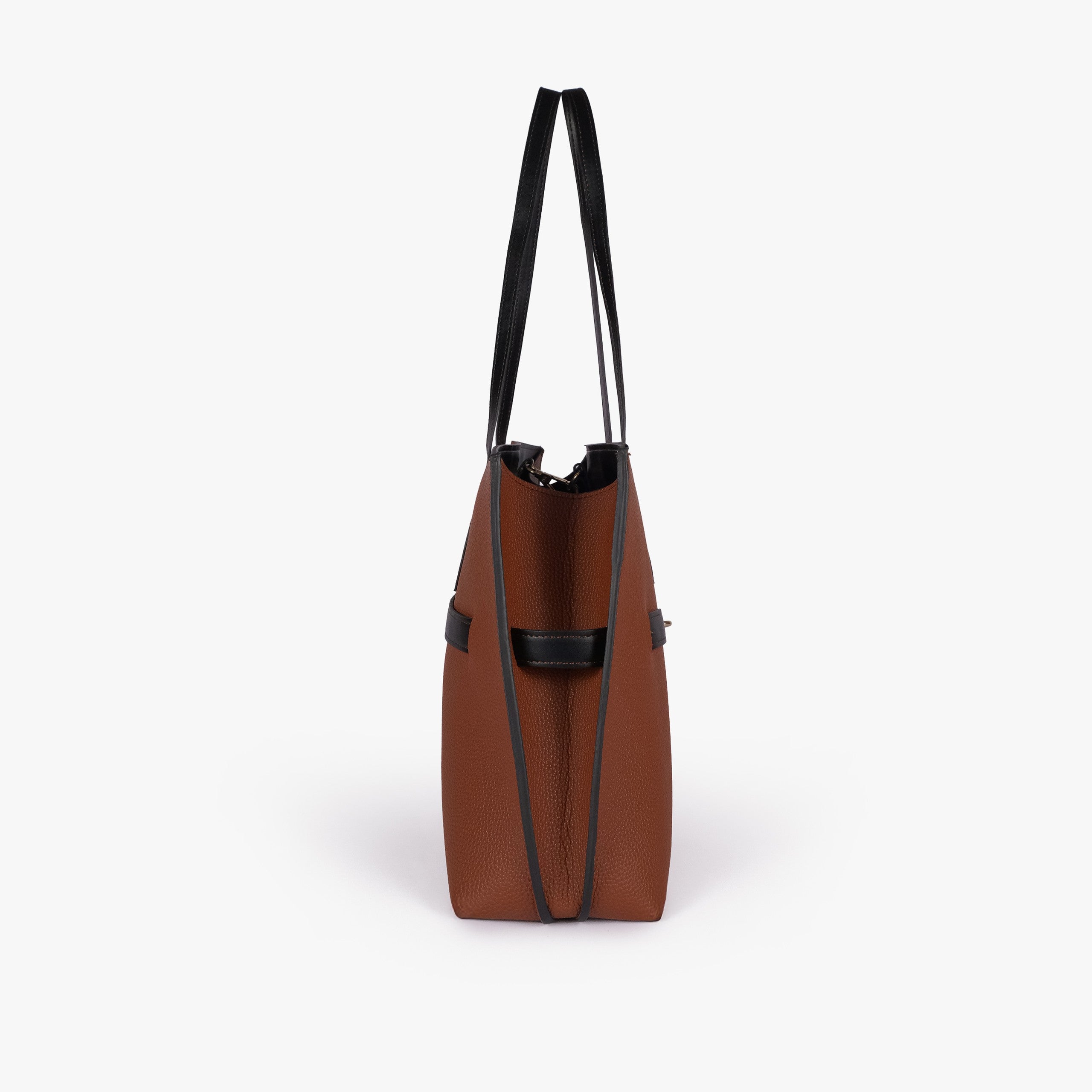 Brown cognac Monday Tote — side profile showing slim gusset and wing-cut origami corner fold with black accent edging