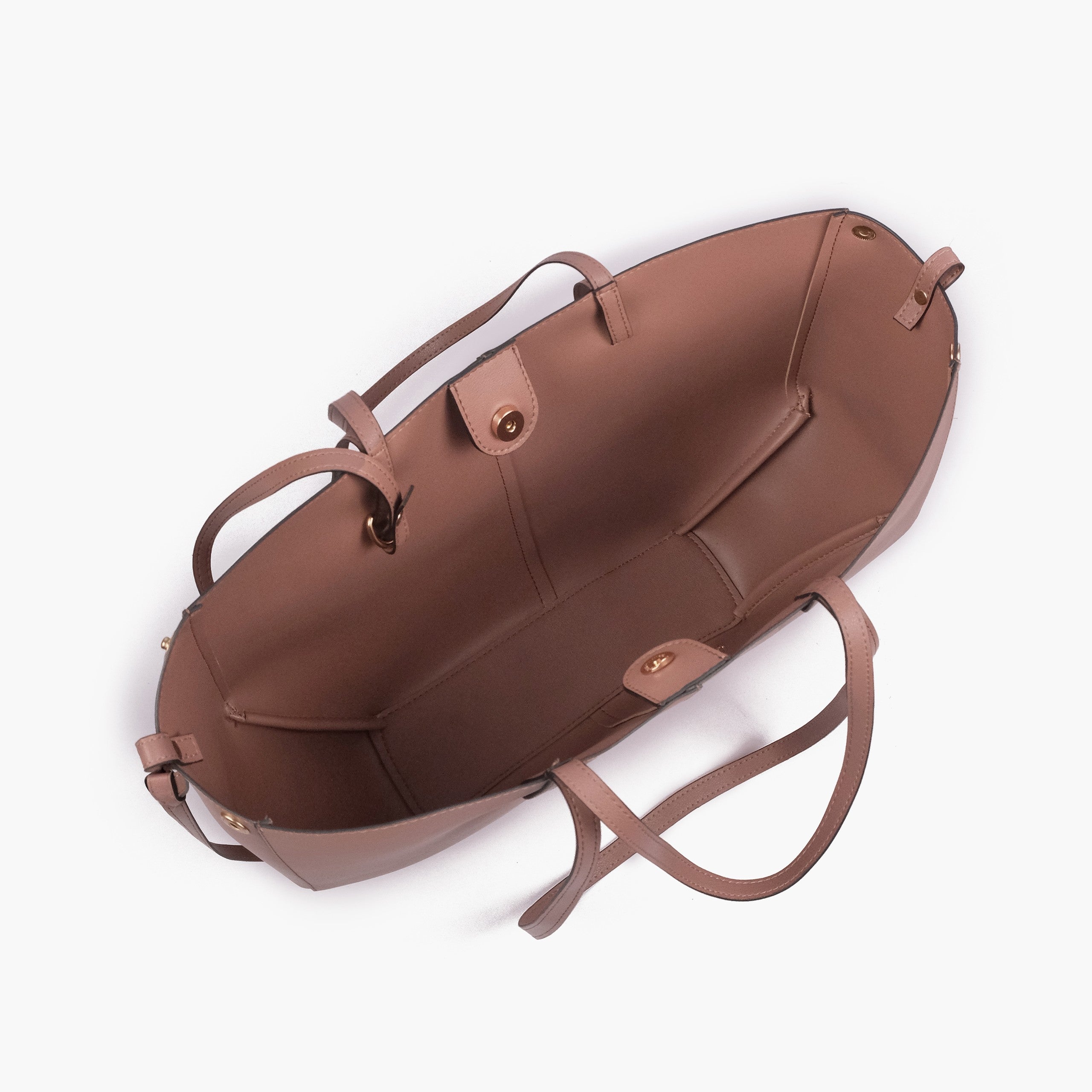 Brown atelier tote — interior top-down view with smooth warm cognac faux leather lining, center divider panel, gold magnetic snap