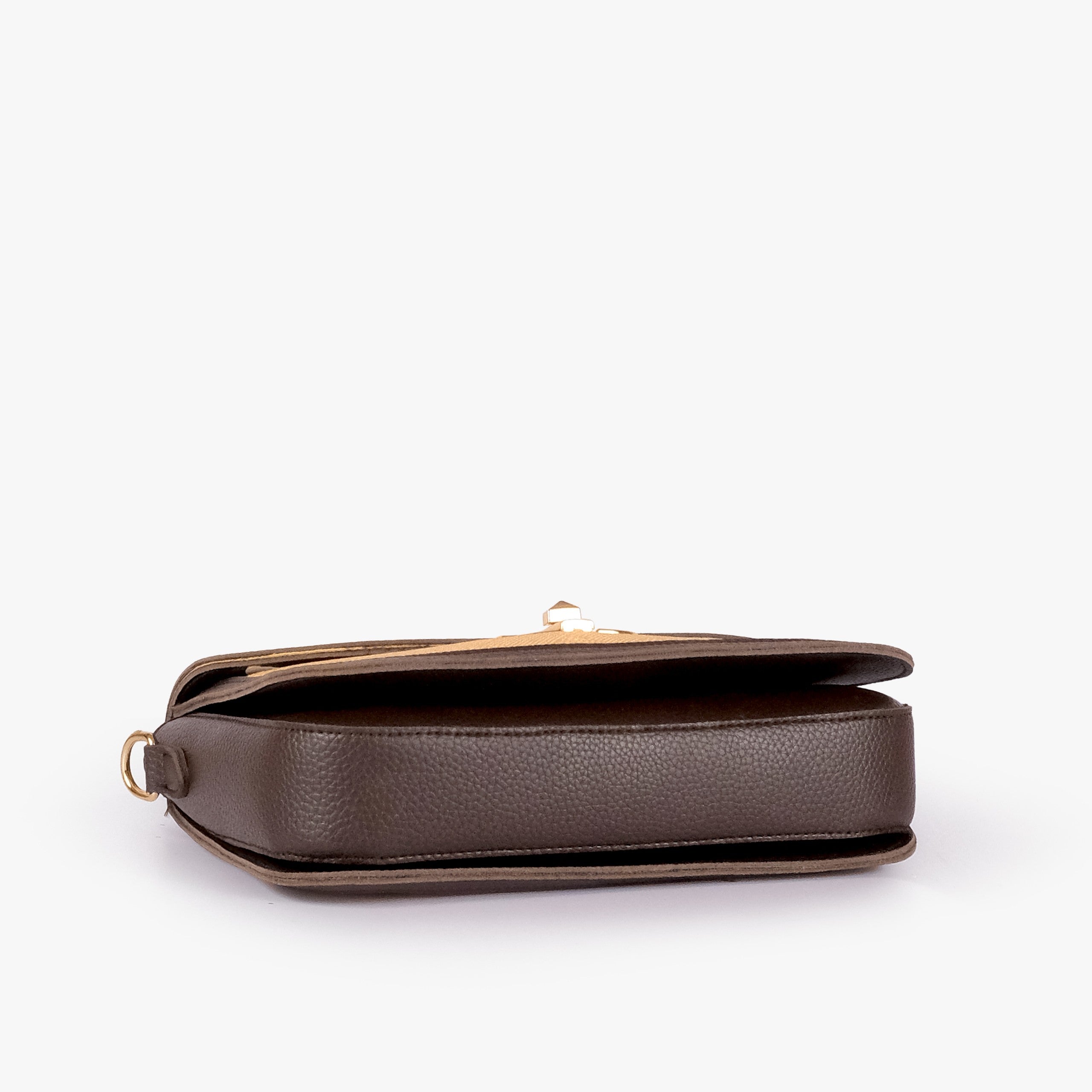 Beige contrast cross-body bag — tilted underside flat lay showing flap edge and bag depth