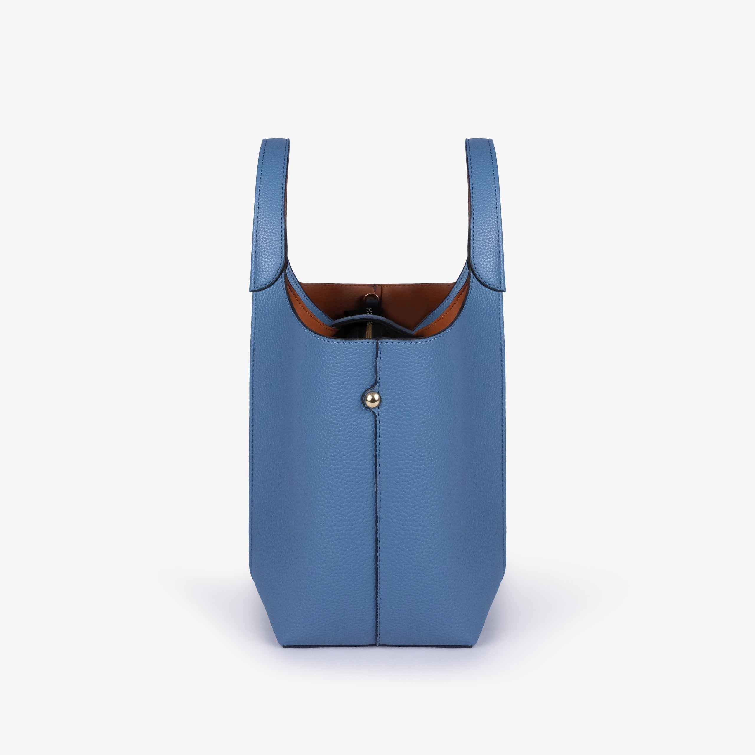 Side profile of Blue scoop mini tote bag