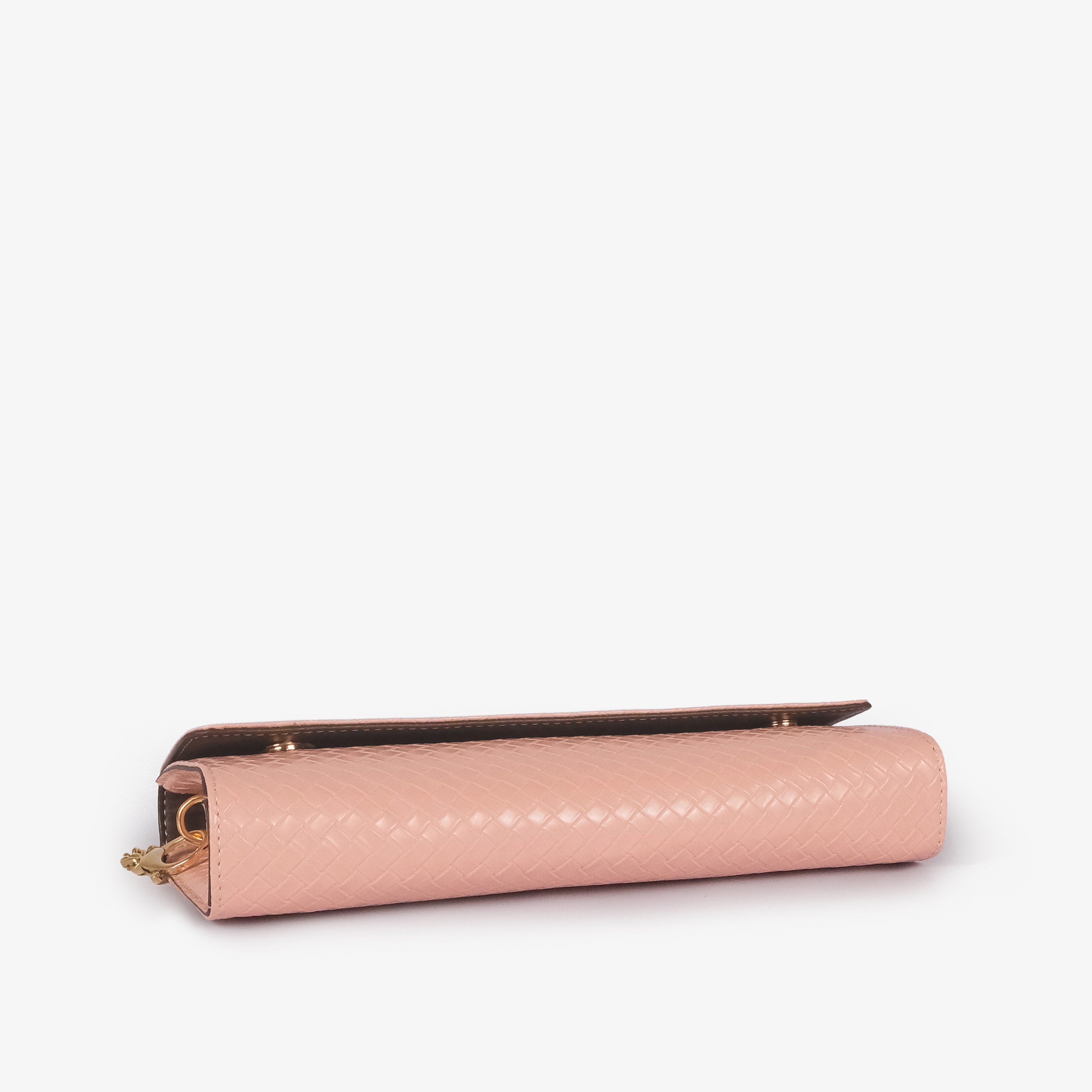 Blush peach woven weave clutch — top-down flat view showing flap closure and blush peach weave surface