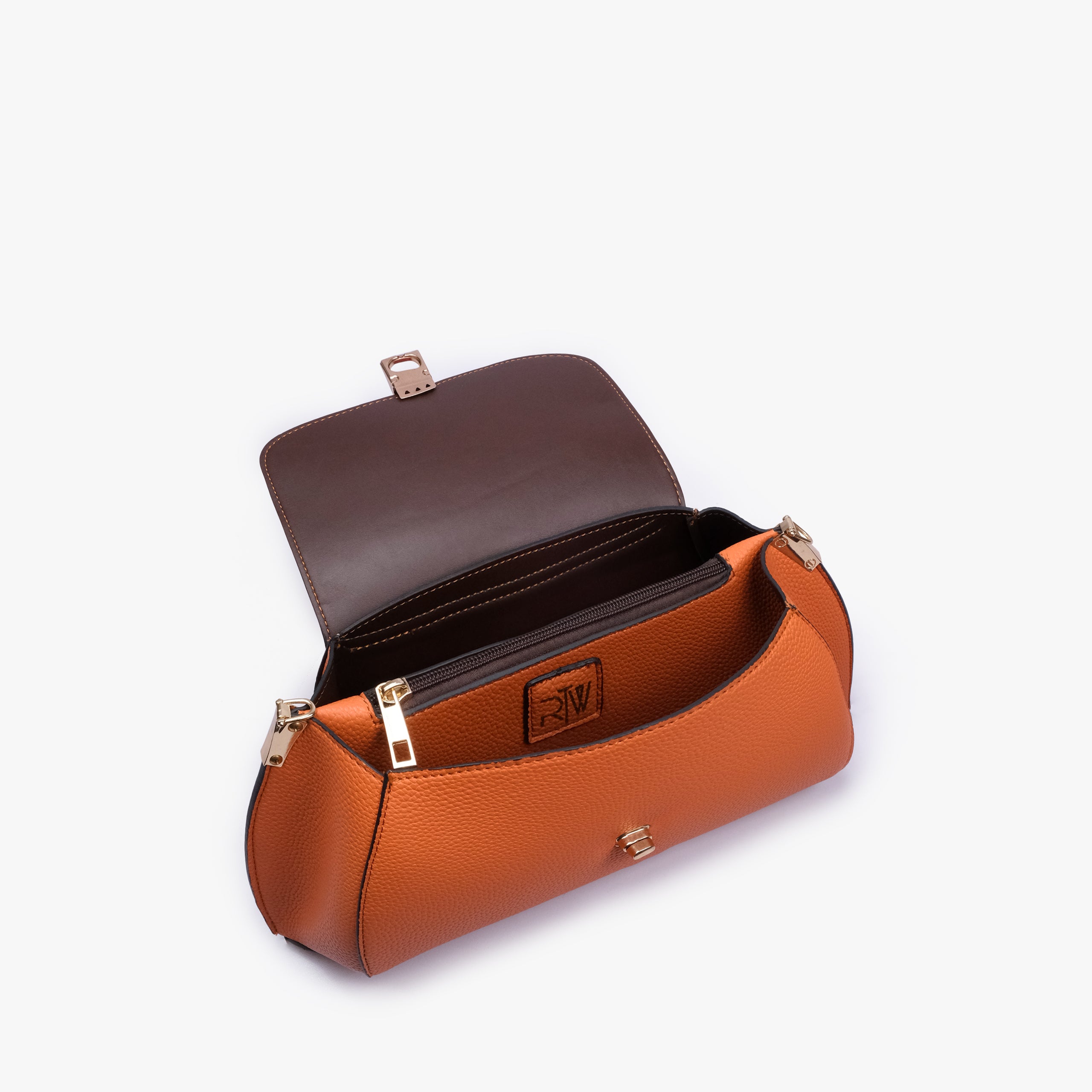 Interior of Orange pebble baguette bag showing the zippered main compartment
