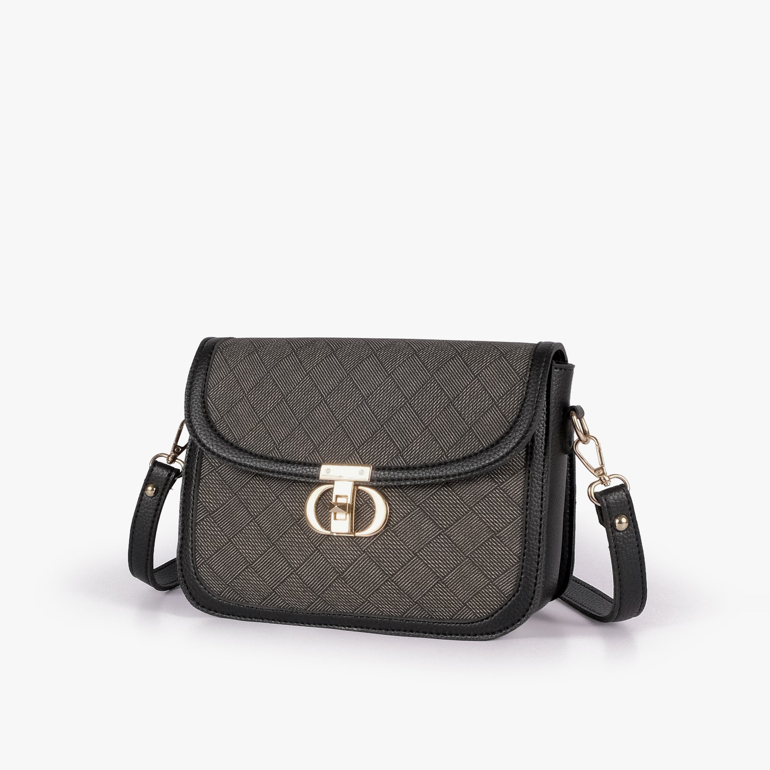 Charcoal contrast cross-body bag — hero 3/4 view, charcoal box-texture panel, black pebbled trim, gold CD twist-lock rockstud, adjustable strap