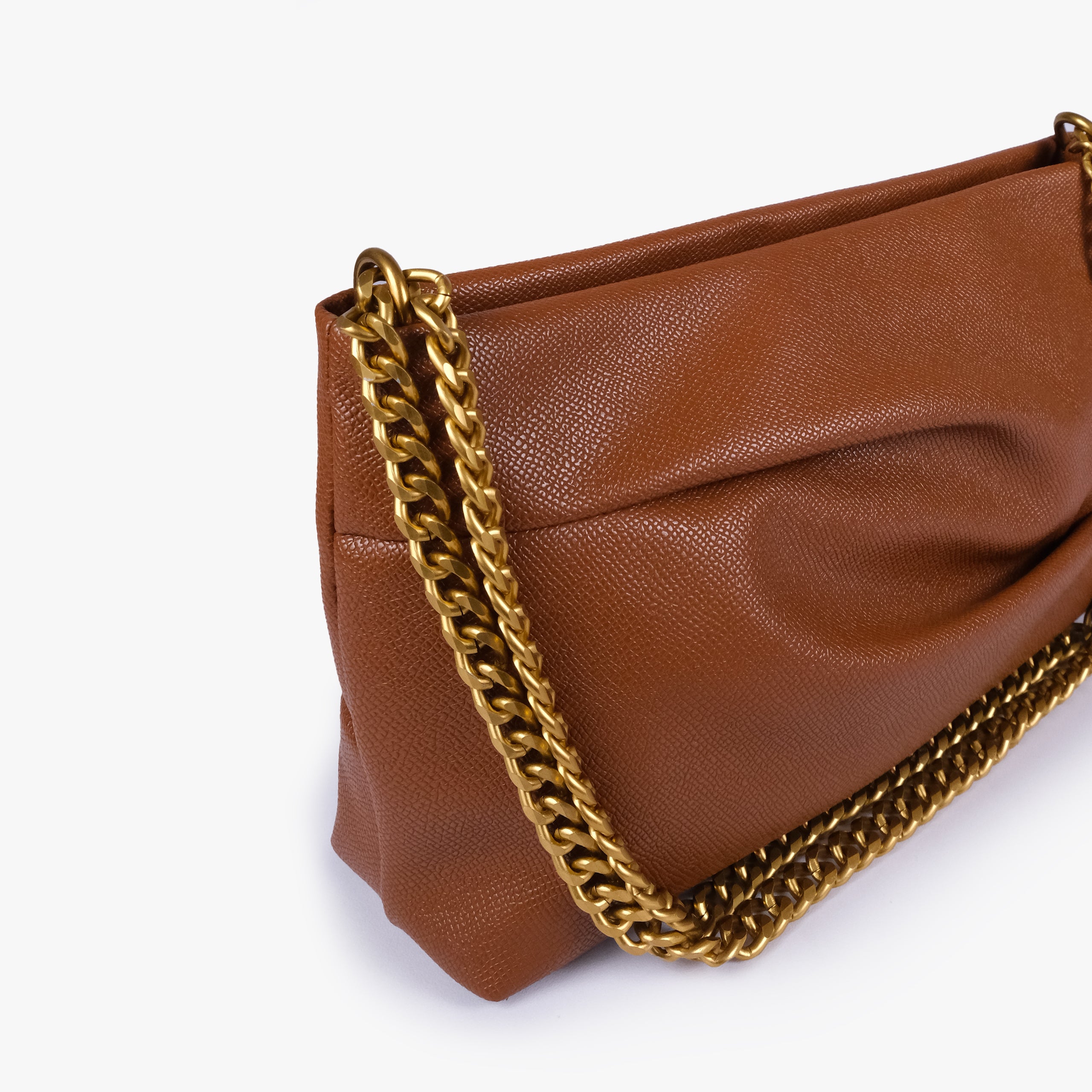 Horse brown pleated clutch bag with chain — close detail showing the pleated faux-leather surface, chain links and top-corner hardware, warm cognac brown