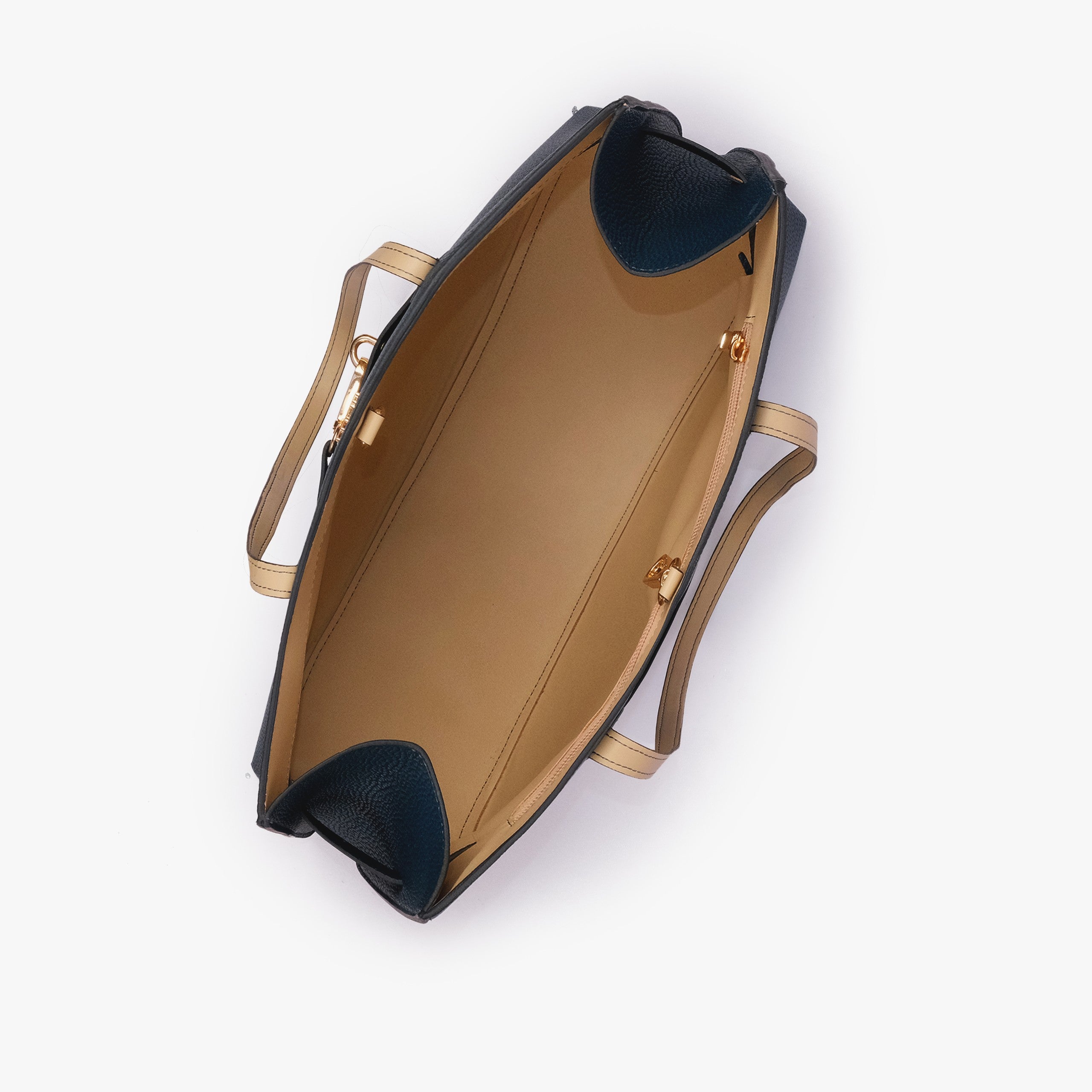 Teal Monday Tote — interior top-down view showing smooth warm sand lining, teal pebbled wing-cut corner folds, back-wall zipper with gold runner