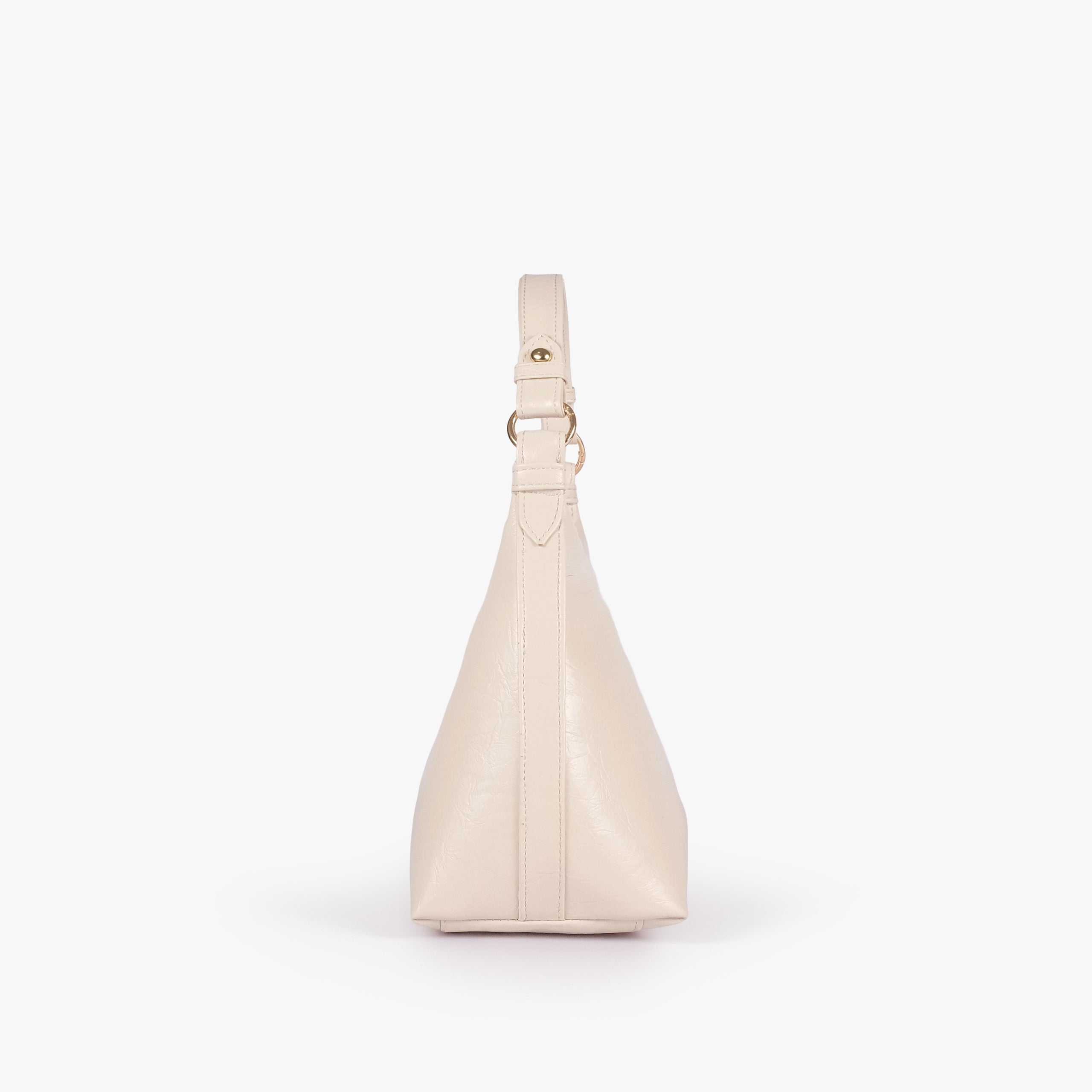 Pearl crinkle crescent hobo — side profile showing the tapered crescent hobo depth and integrated shoulder handle
