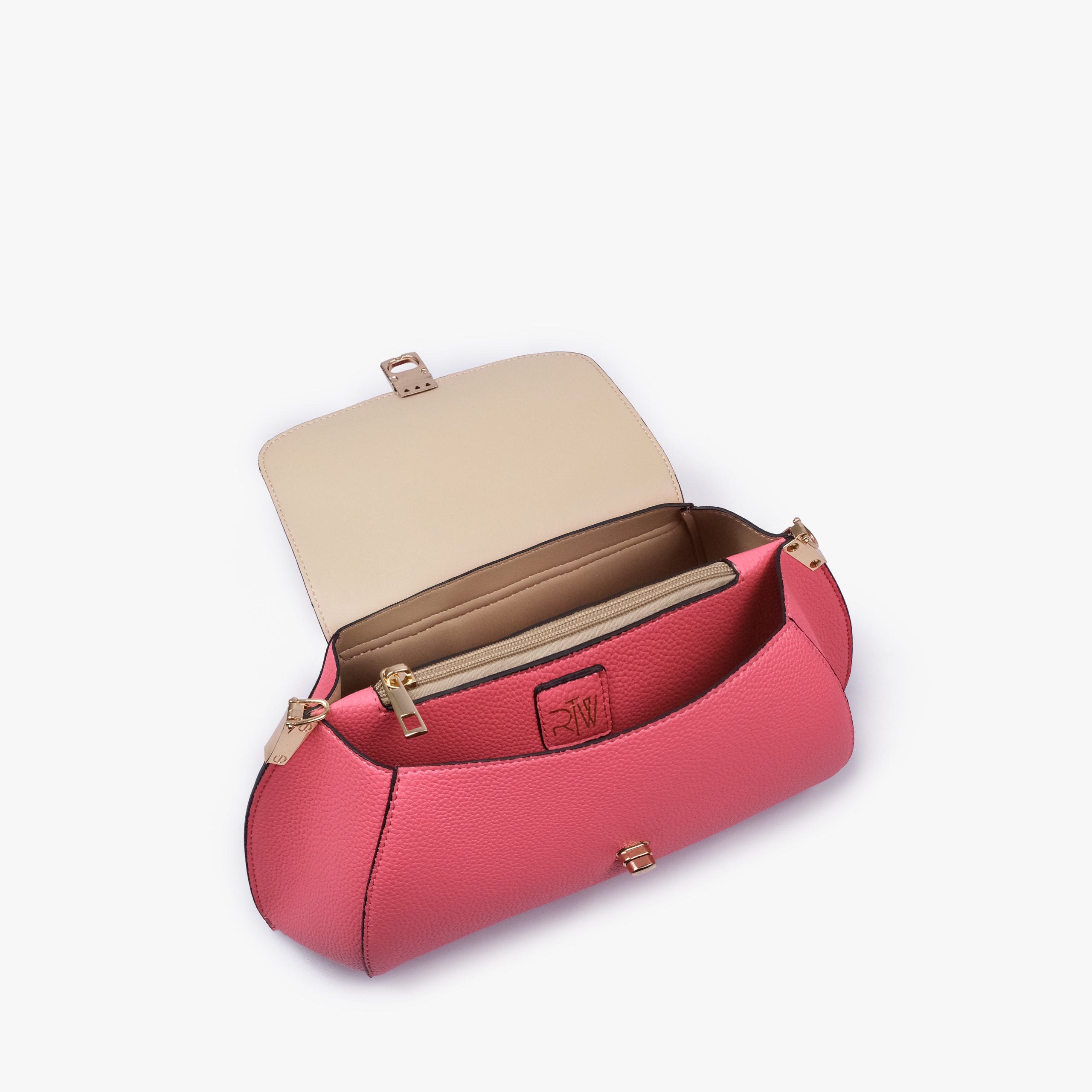 Interior of Raspberry pink pebble baguette bag showing the zippered main compartment