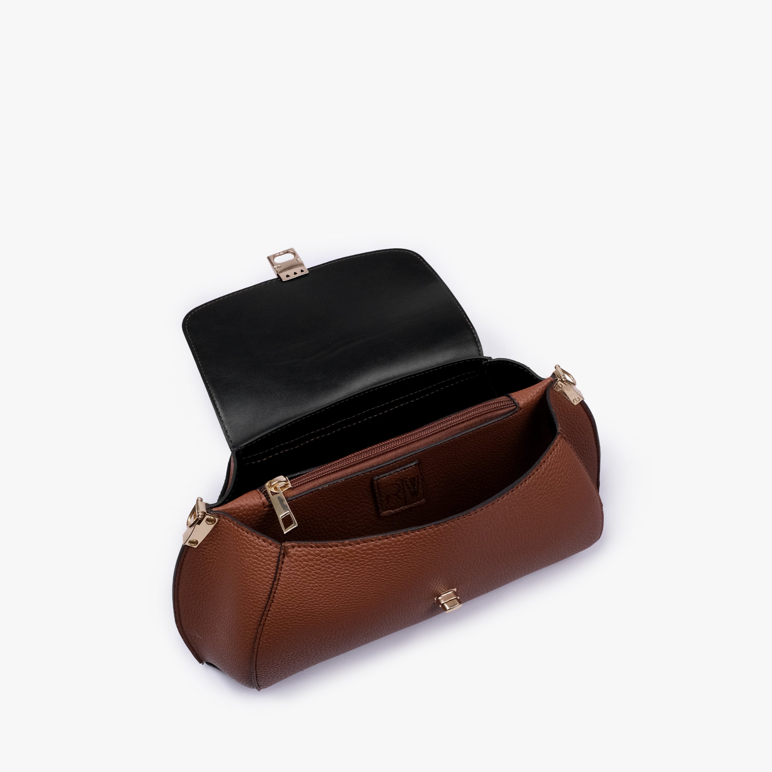 Interior of Brown pebble baguette bag showing the zippered main compartment