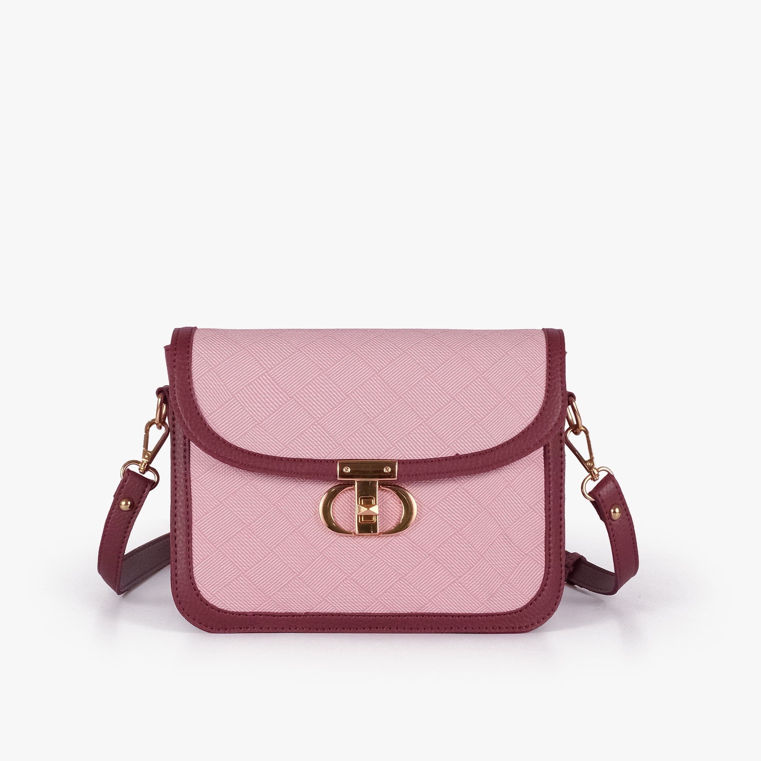 Pink contrast cross-body bag — front straight-on with burgundy strap horizontal across soft pink panel