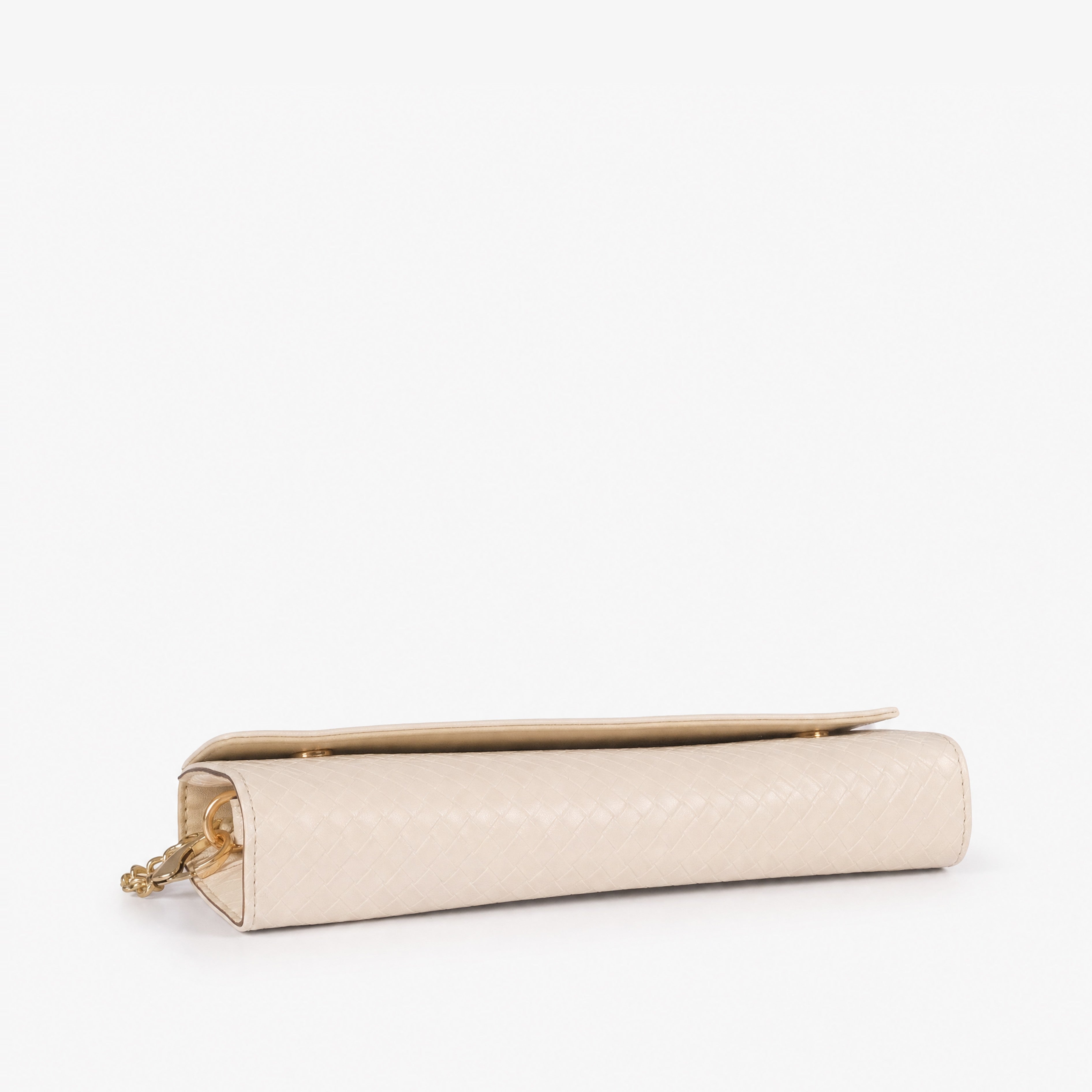 Pale woven cream weave clutch — top-down flat view showing flap closure and full cream weave outer surface