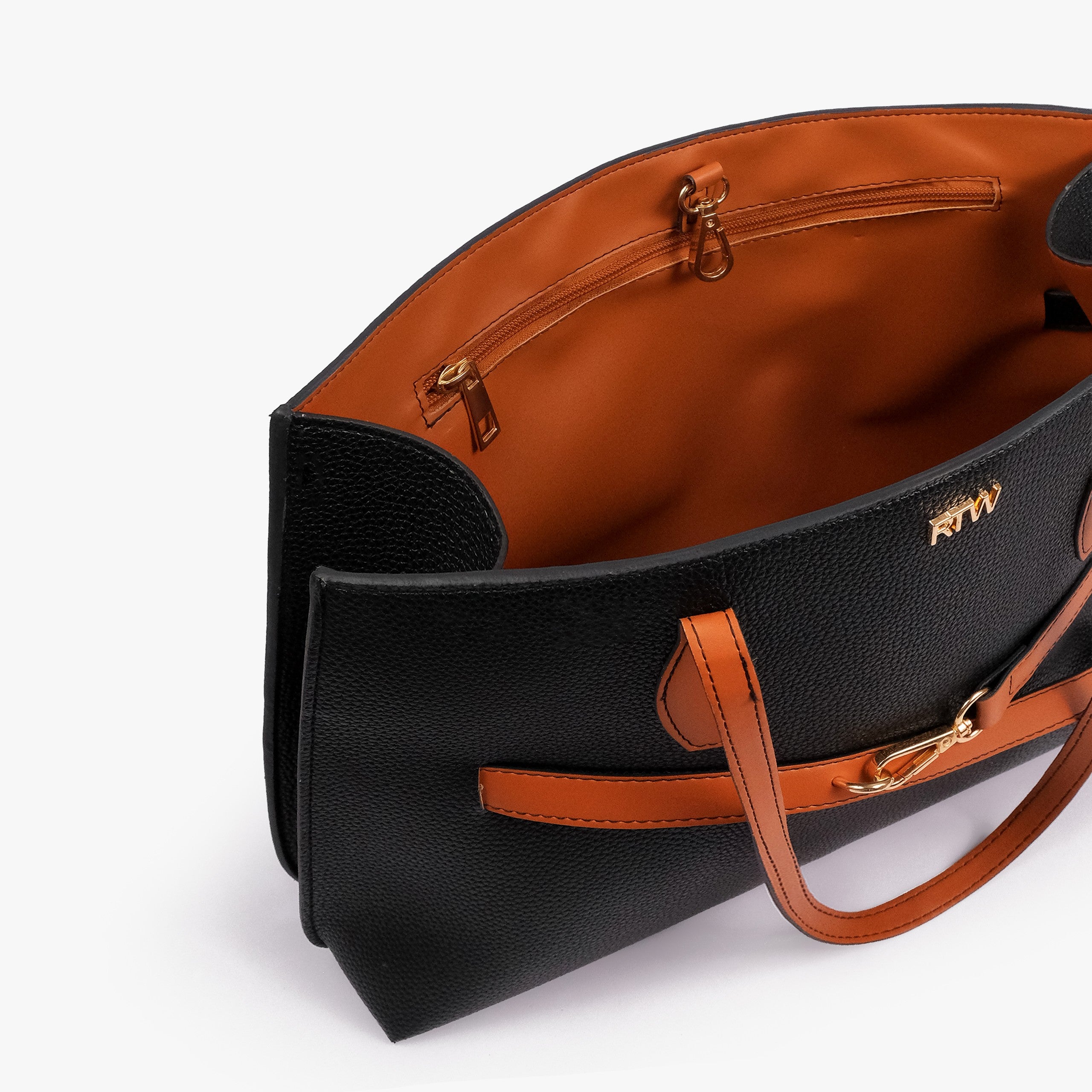 Black Monday Tote — interior angled view showing back-wall zipped pocket, gold zipper, burnt orange lining, gold D-fittings