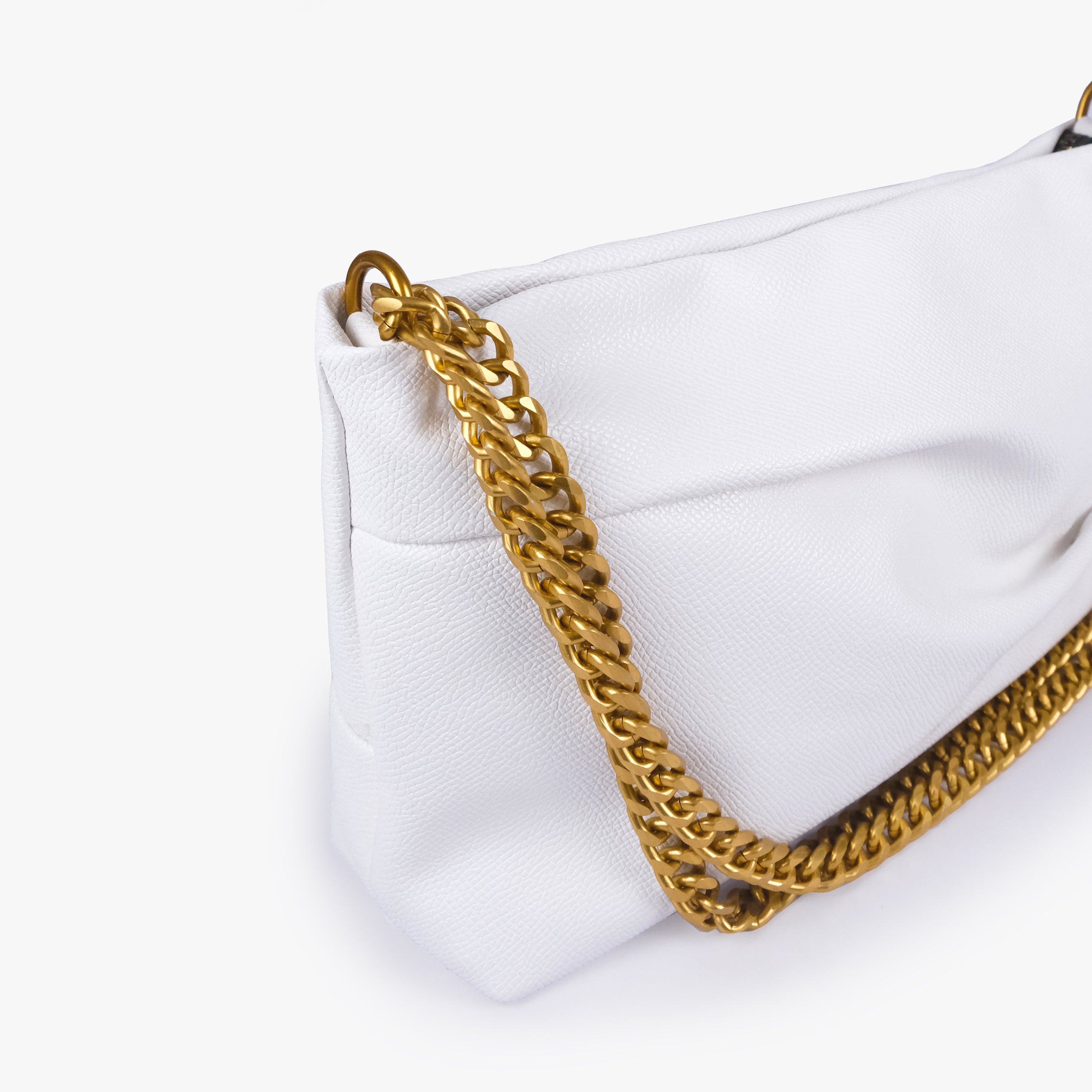 White pleated clutch bag with chain — close detail showing the pleated faux-leather surface, chain links and top-corner hardware, bright white