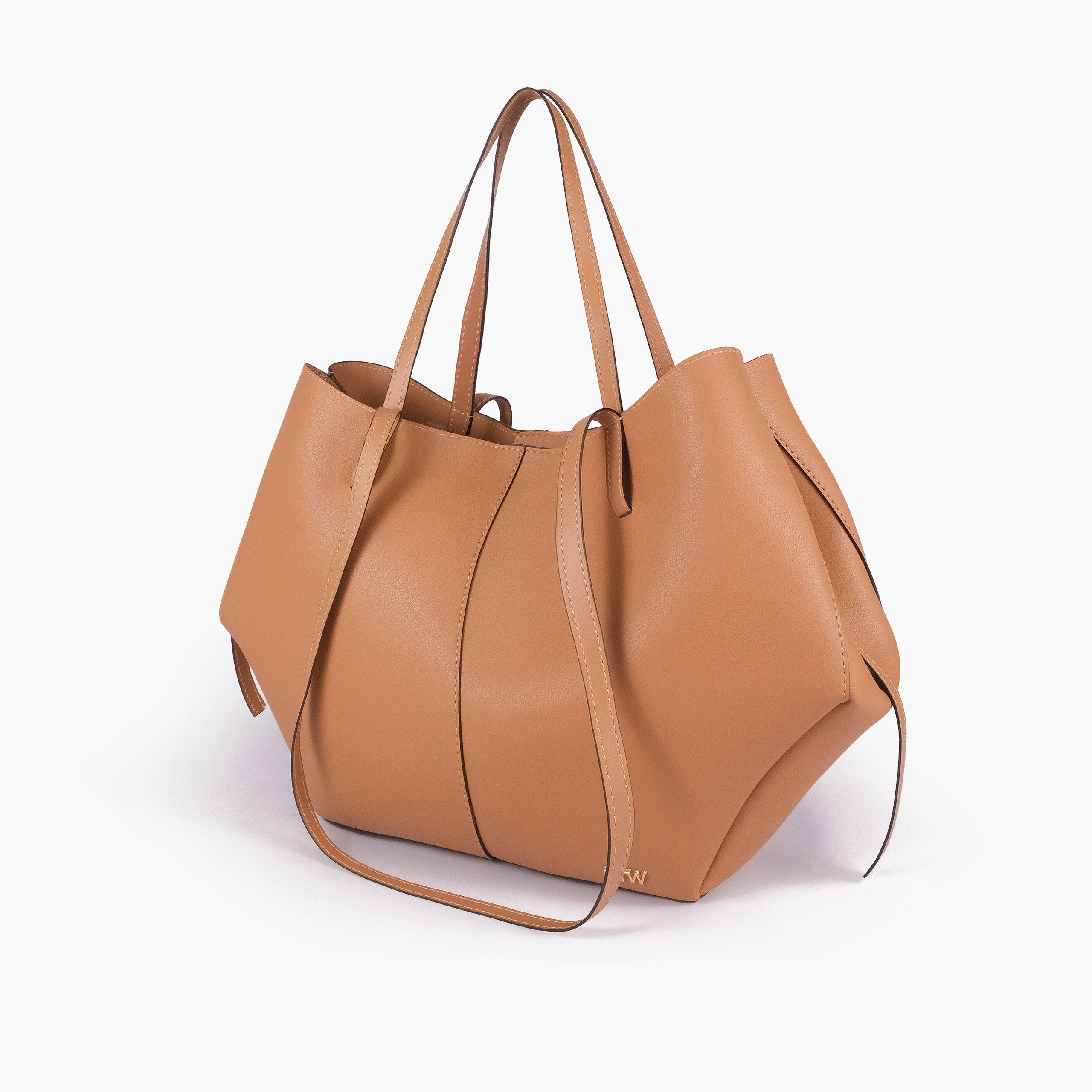 Coffee atelier tote — hero 3/4 quarter view, warm camel-tan smooth faux leather, wing-cut origami side panels, slim handles, gold RTW logo at front base