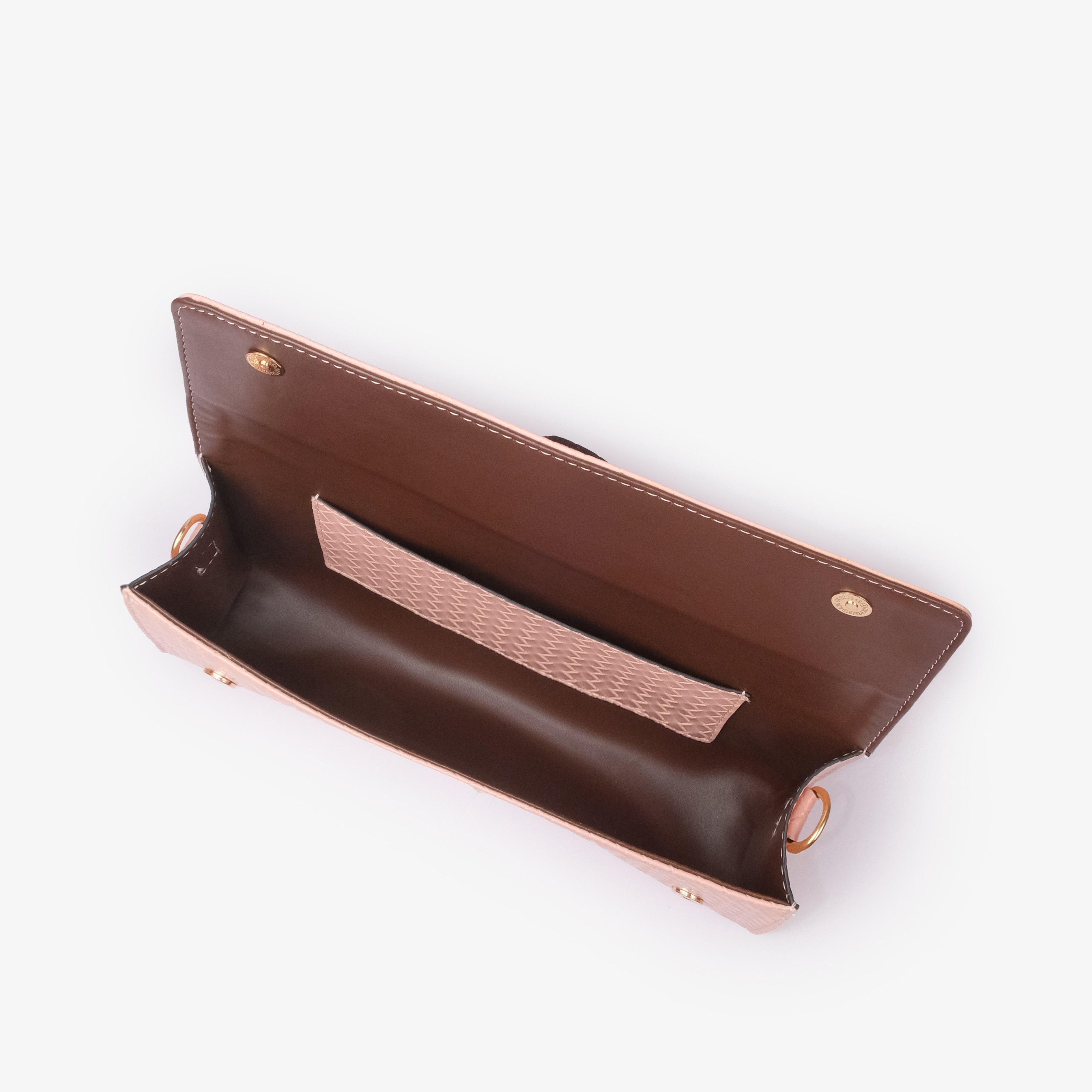 Blush peach woven weave clutch — interior open view with smooth deep chocolate brown faux leather lining and peach woven slip pocket