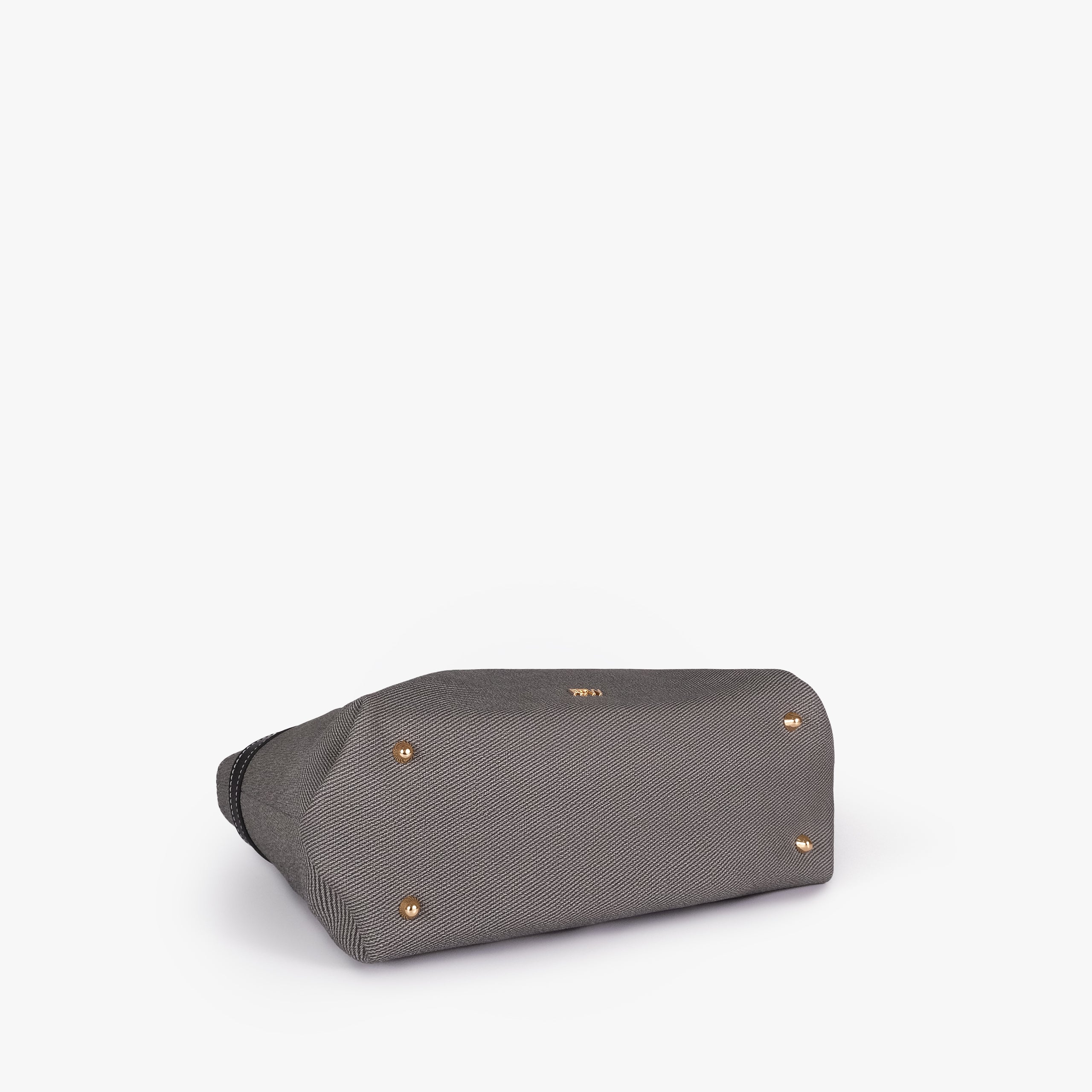 Charcoal belted tote bag — bottom view showing the structured base, smooth trim, and metal feet, charcoal gray textured body with black smooth faux-leather trim