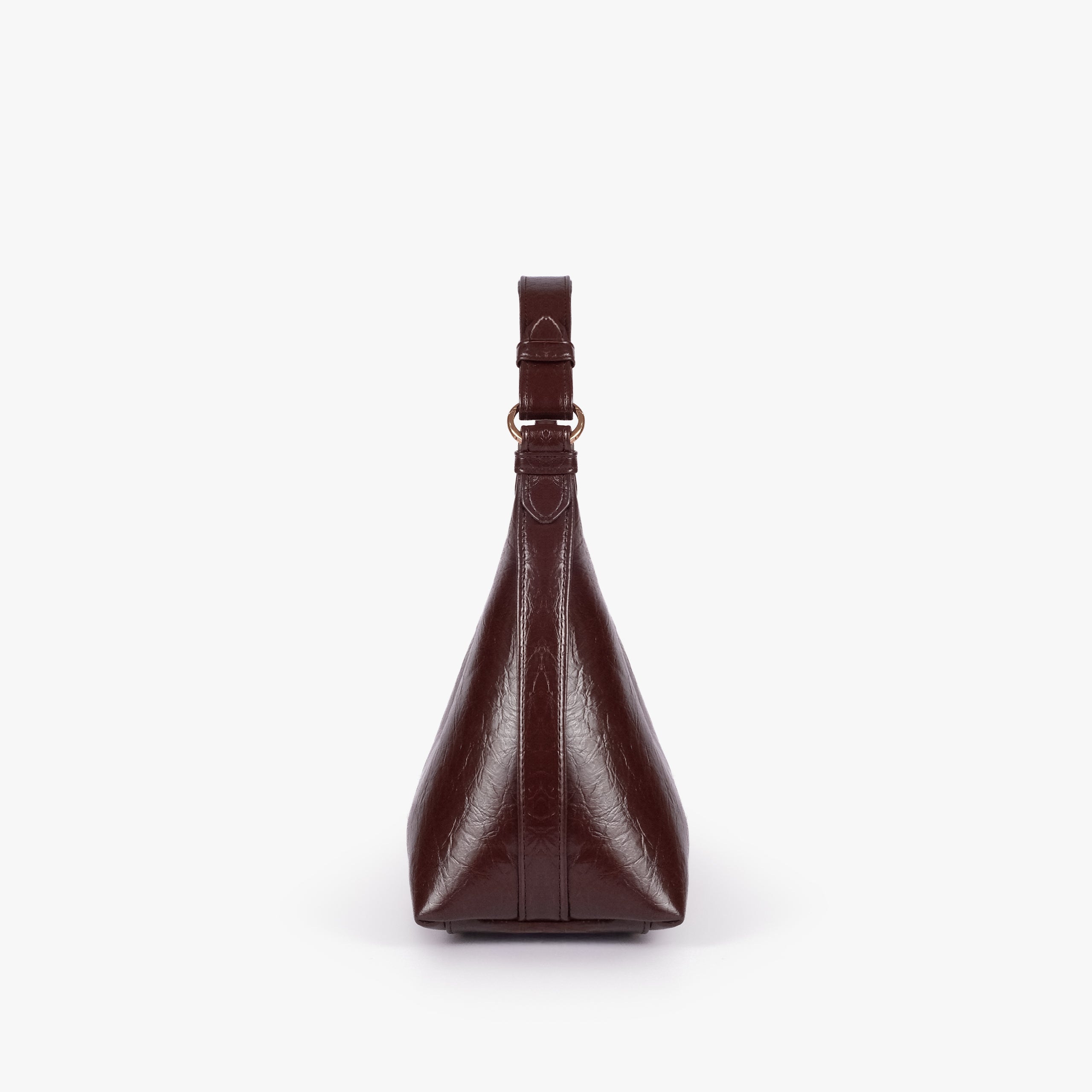 Dark brown crinkle crescent hobo — side profile showing the tapered crescent hobo depth and integrated shoulder handle