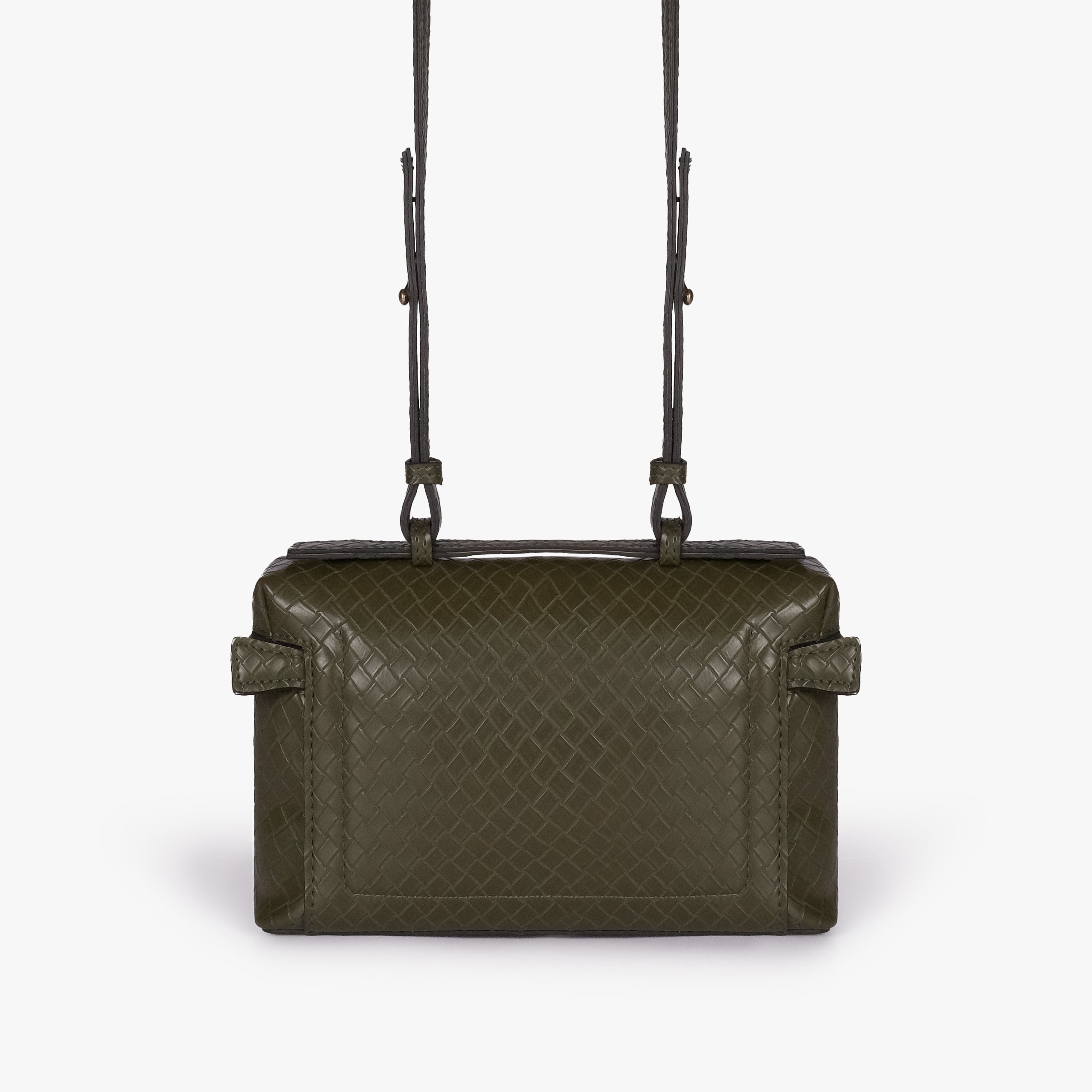 Olive green weave vanity top-handle bag — back view showing the plain quilted back panel, top handle, long strap, flat base line, and no visible exterior pocket