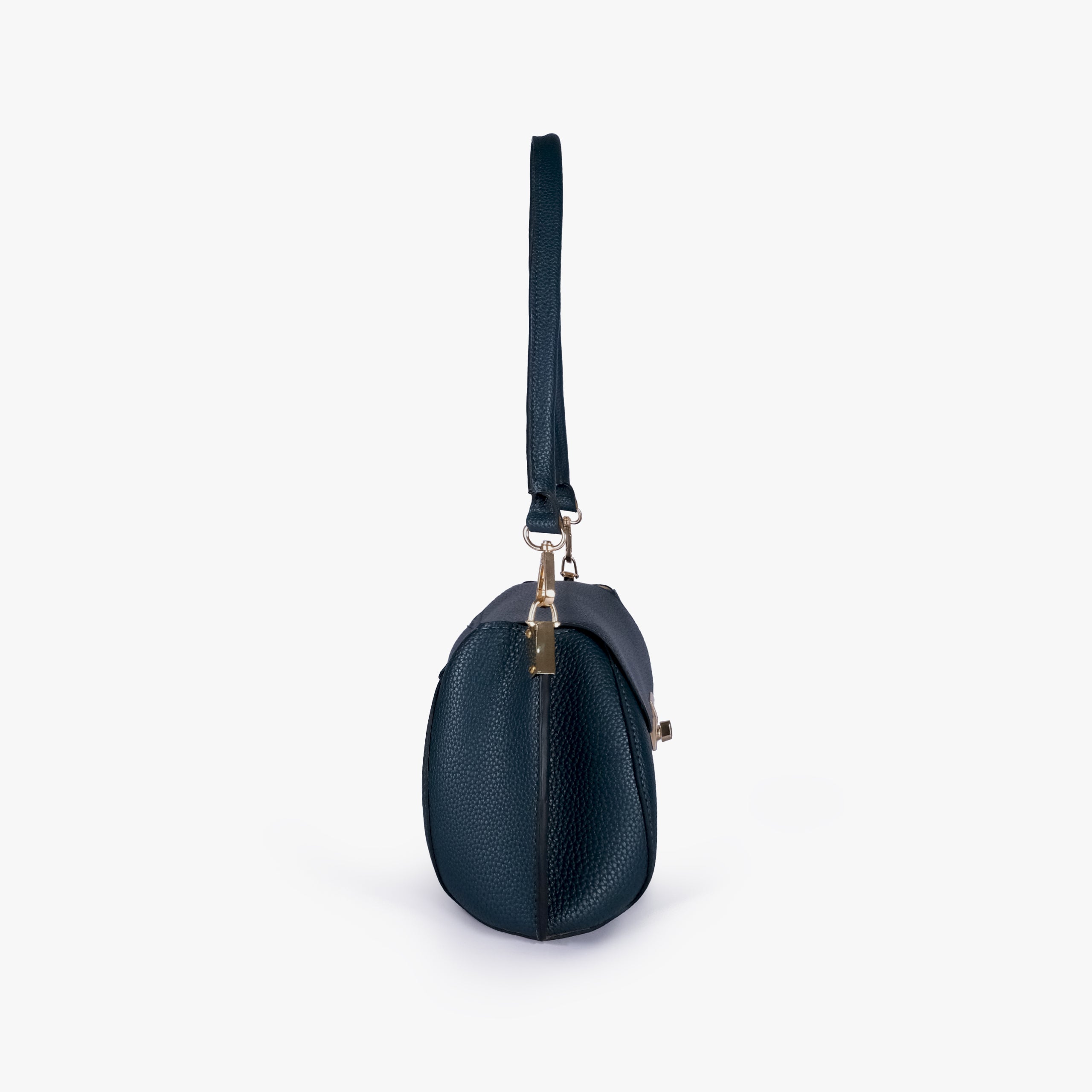 Side profile of Teal pebble baguette bag