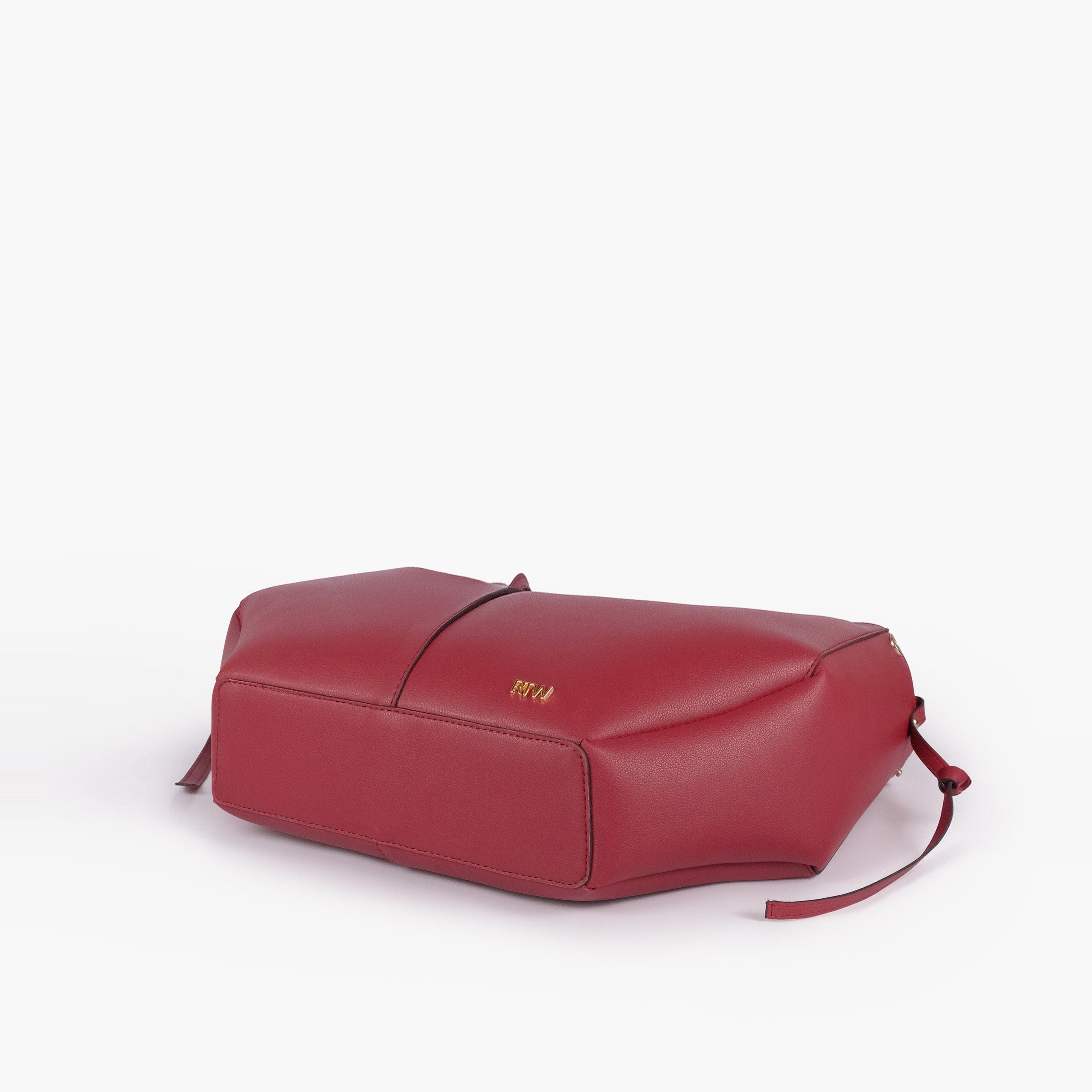 Maroon atelier tote — base angle showing reinforced flat base, gold RTW logo on front-bottom face