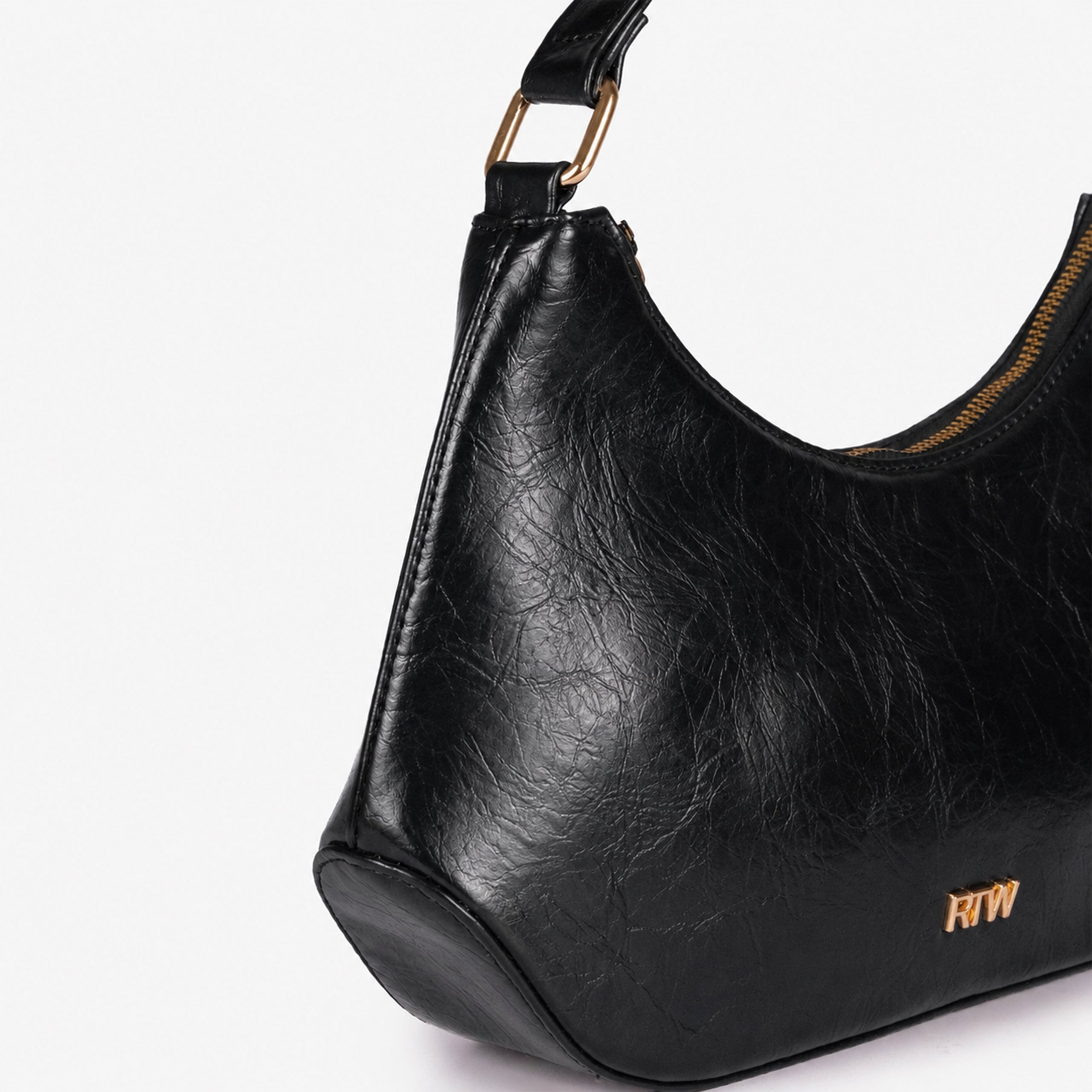 Black crinkle shoulder bag — closeup showing the crinkled faux-leather texture and crinkled texture, zip-top detail, and minimal gold-tone detail
