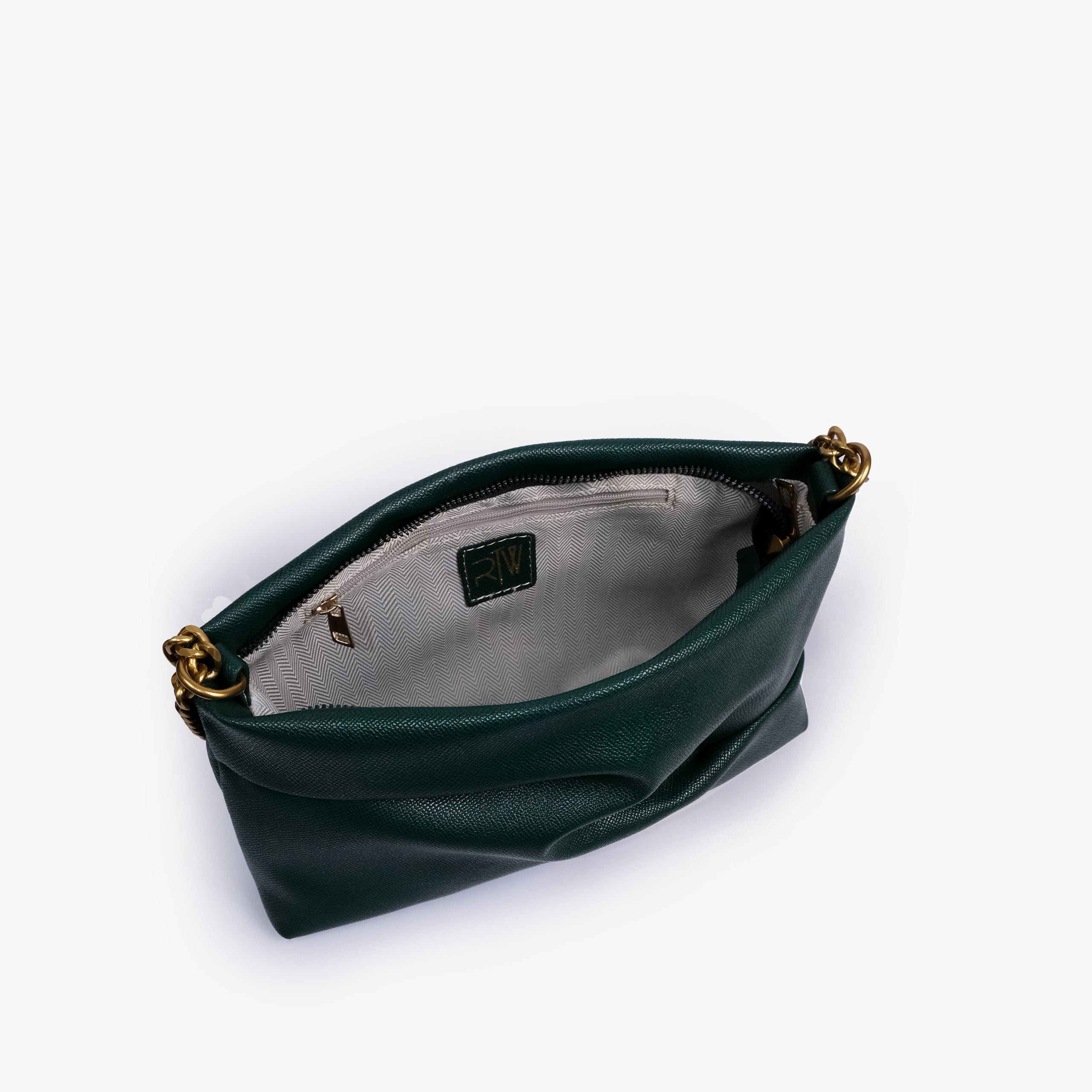 Green pleated clutch bag with chain — open interior view showing the zipper closure, light lining, RTW label and interior zip pocket, deep bottle green